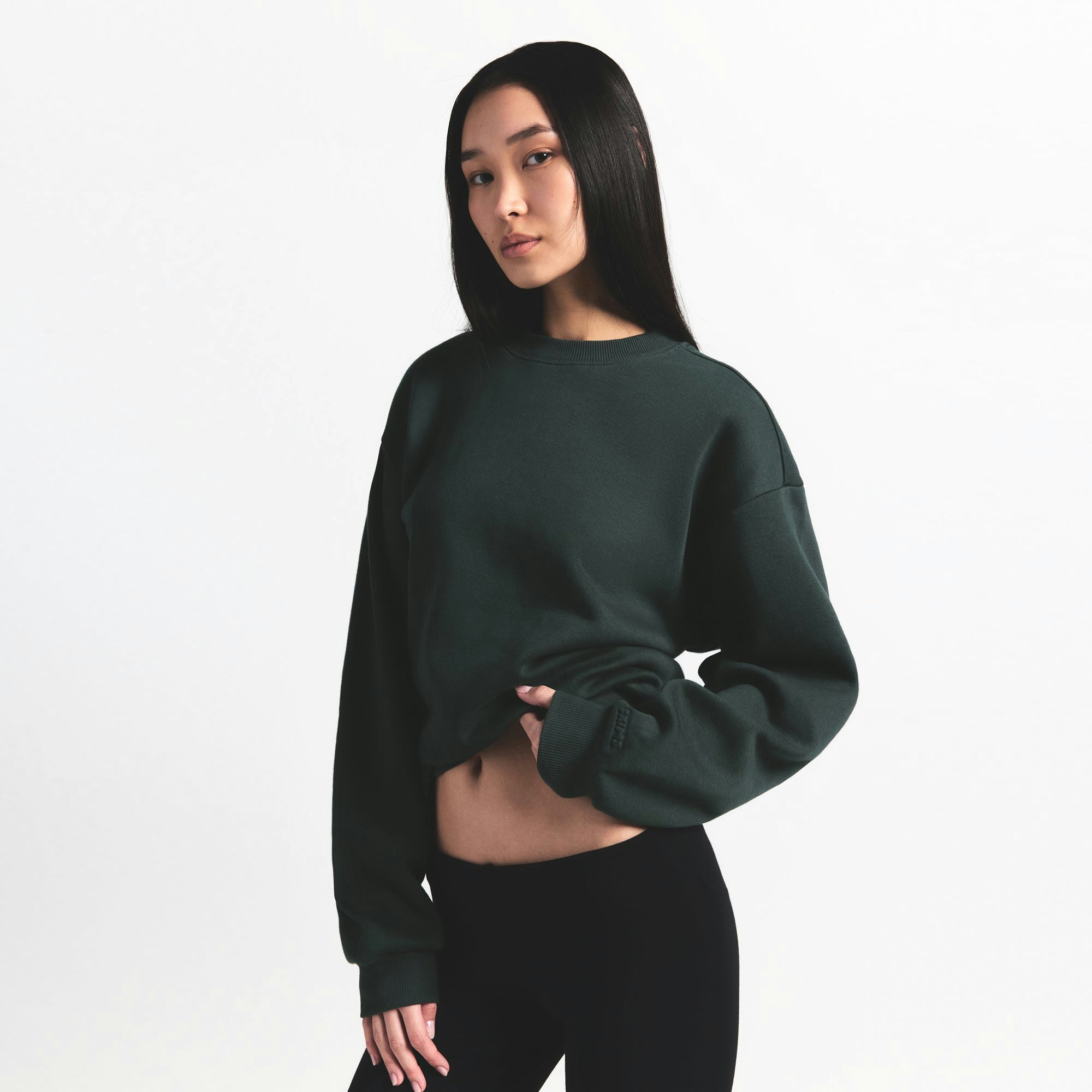 COTTON FLEECE CLASSIC CREWNECK | SPRUCE ON A MODEL SIDE VIEW @ | FOCUS: 0.0, 1.0, 0.9