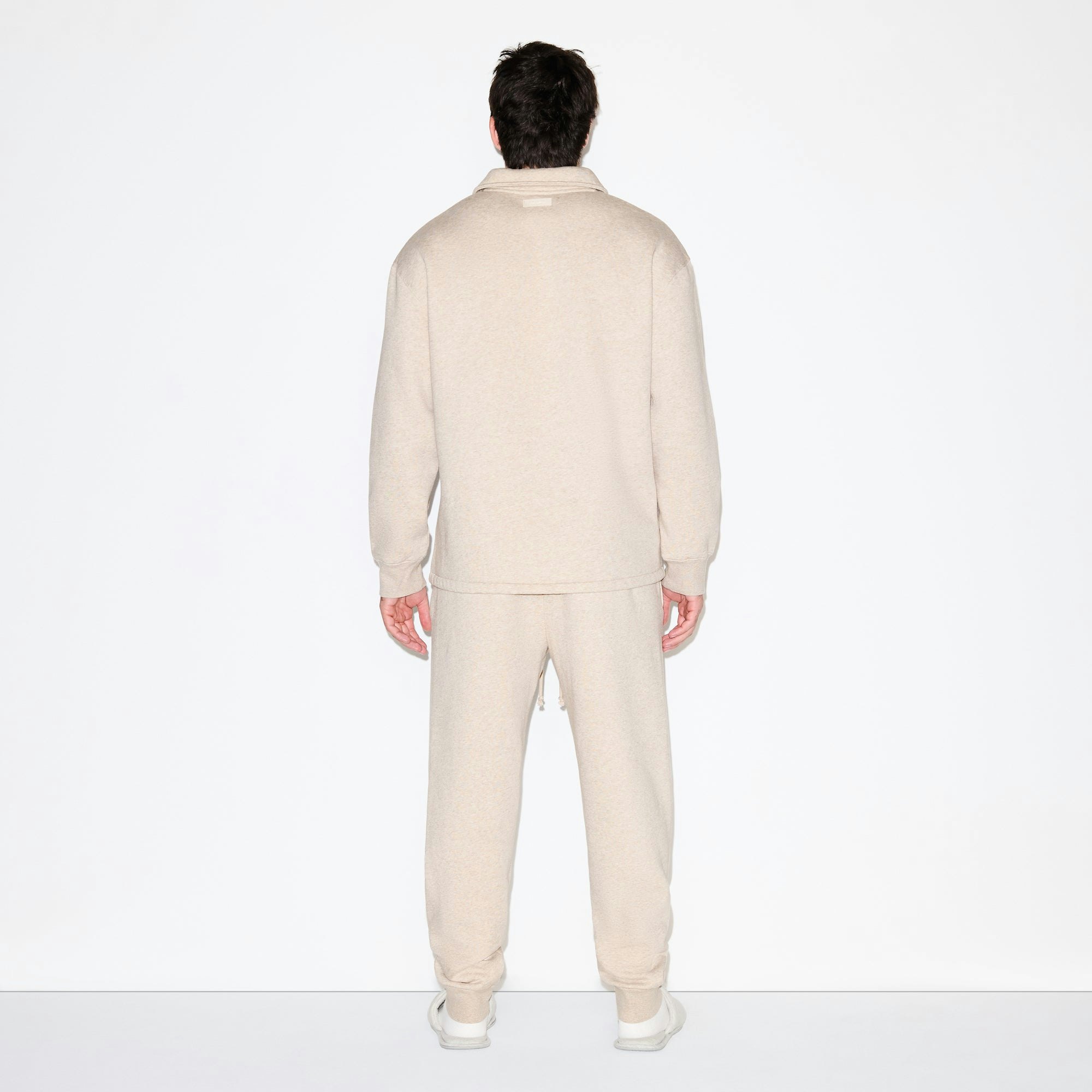 FLEECE LOUNGE MENS RELAXED POLO | DESERT HEATHER GREY ON A MODEL FRONT VIEW @ | FOCUS: 0.0, 1.0, 0.9