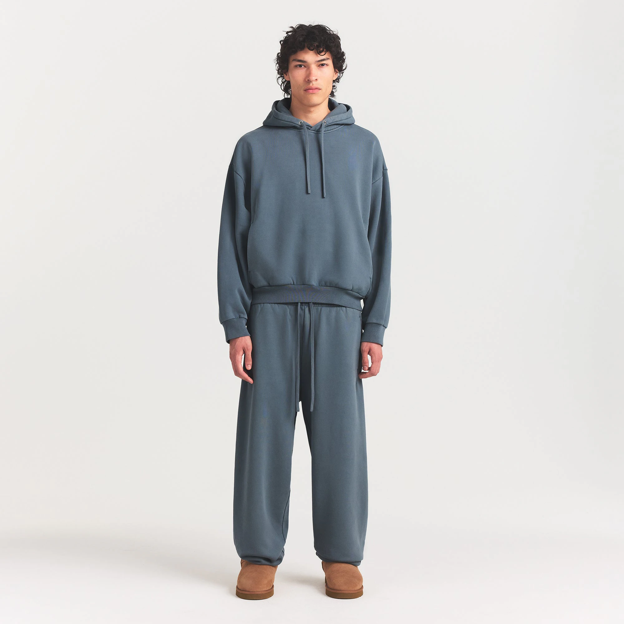 HEAVYWEIGHT FLEECE MENS HOODIE | KYANITE ON A MODEL FRONT VIEW @ | FOCUS: 0.0, 1.0, 0.9