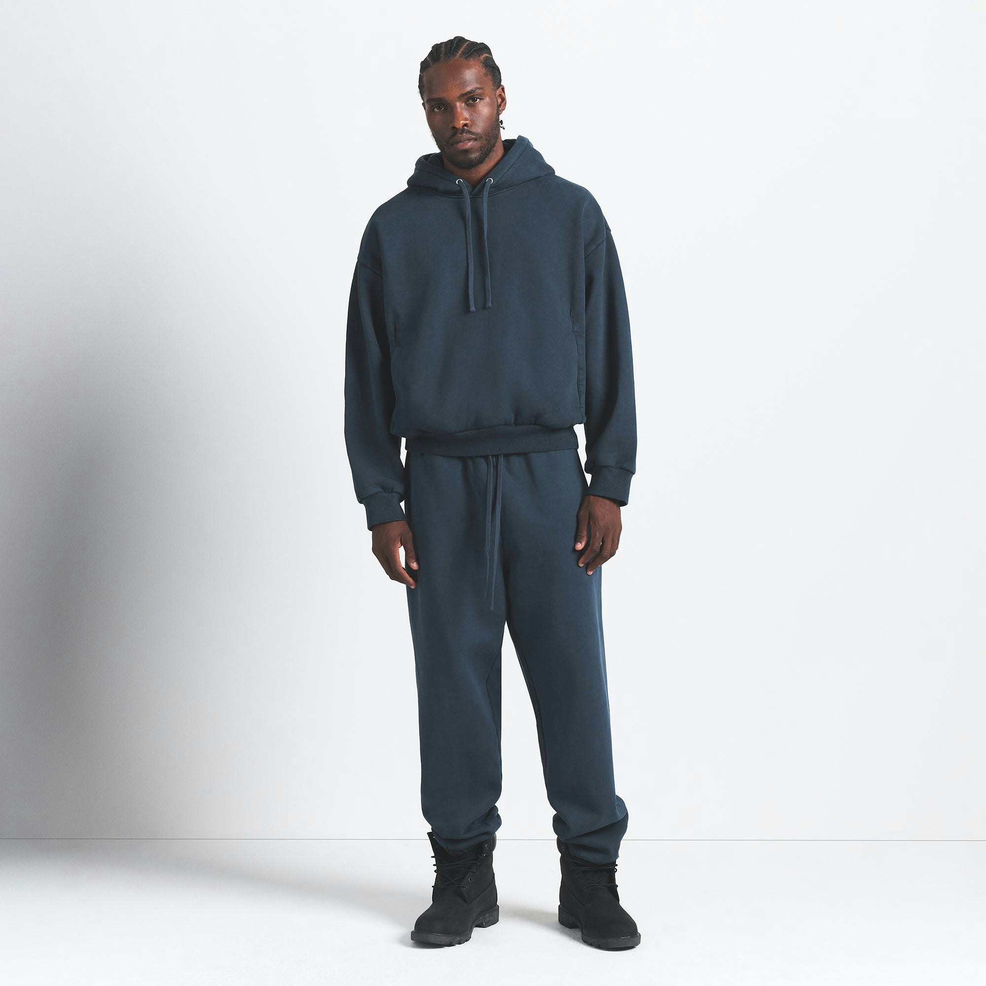 HEAVYWEIGHT FLEECE MENS HOODIE | NAVY ON A MODEL FRONT VIEW @ | FOCUS: 0.0, 1.0, 0.9