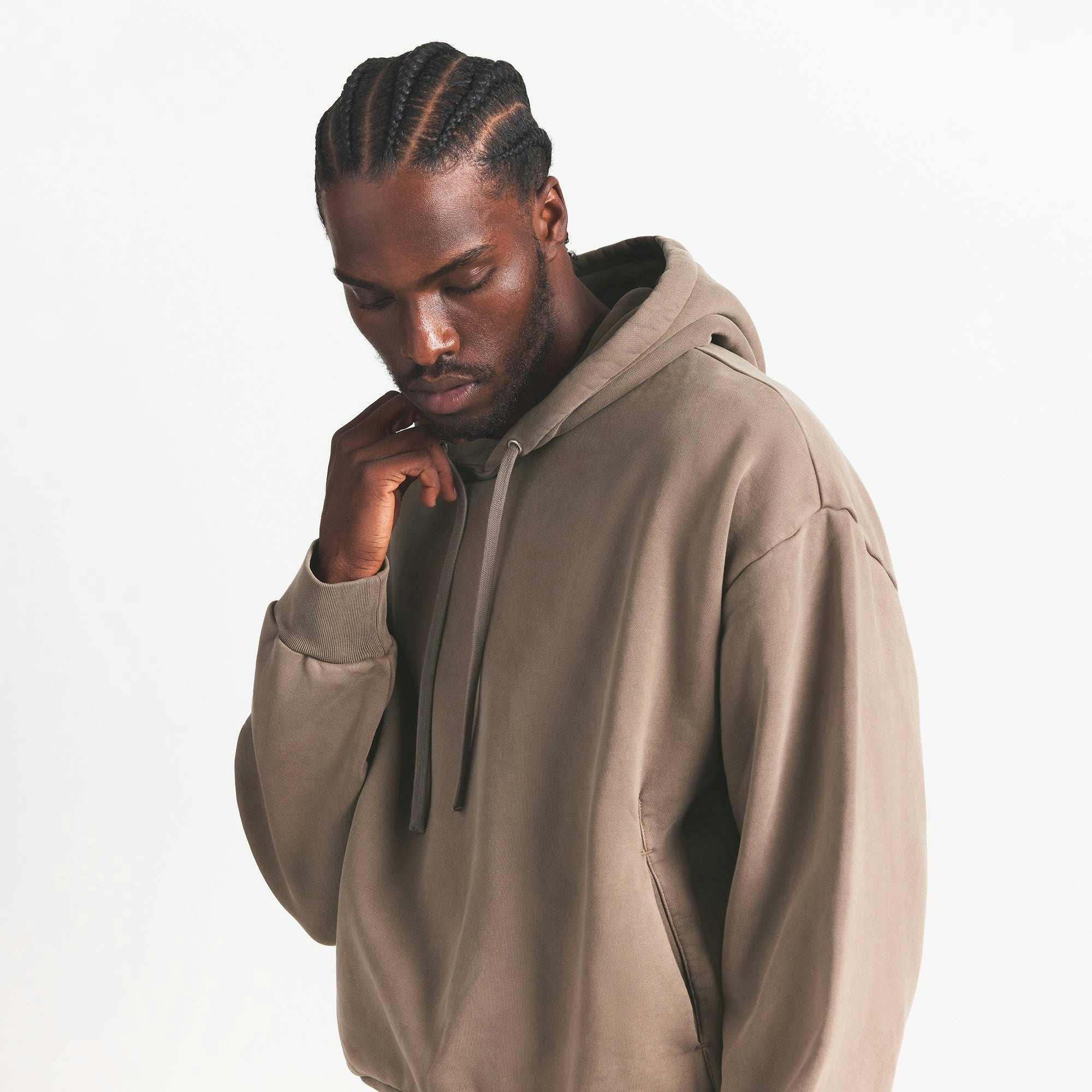 HEAVYWEIGHT FLEECE MENS HOODIE | TRUFFLE ON A MODEL SIDE VIEW @ | FOCUS: 0.0, 1.0, 0.9