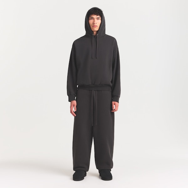 HEAVYWEIGHT FLEECE MENS HOODIE | WASHED ONYX ON A MODEL FRONT VIEW @ | FOCUS: 0.0, 1.0, 0.9