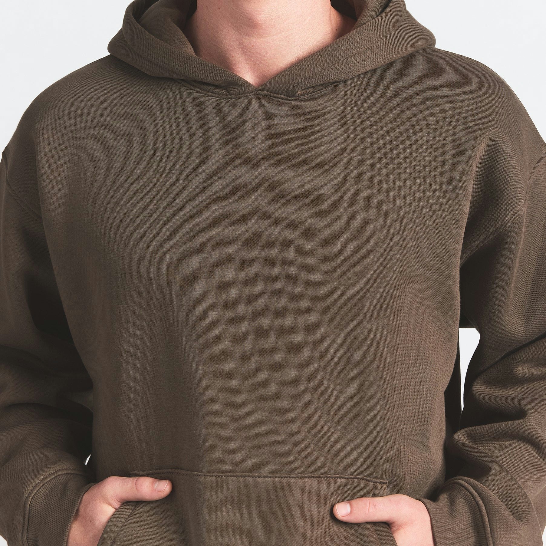 FLEECE LOUNGE MENS RELAXED HOODIE | DRIFTWOOD ON A MODEL FRONT VIEW @ | FOCUS: 0.0, 1.0, 0.9