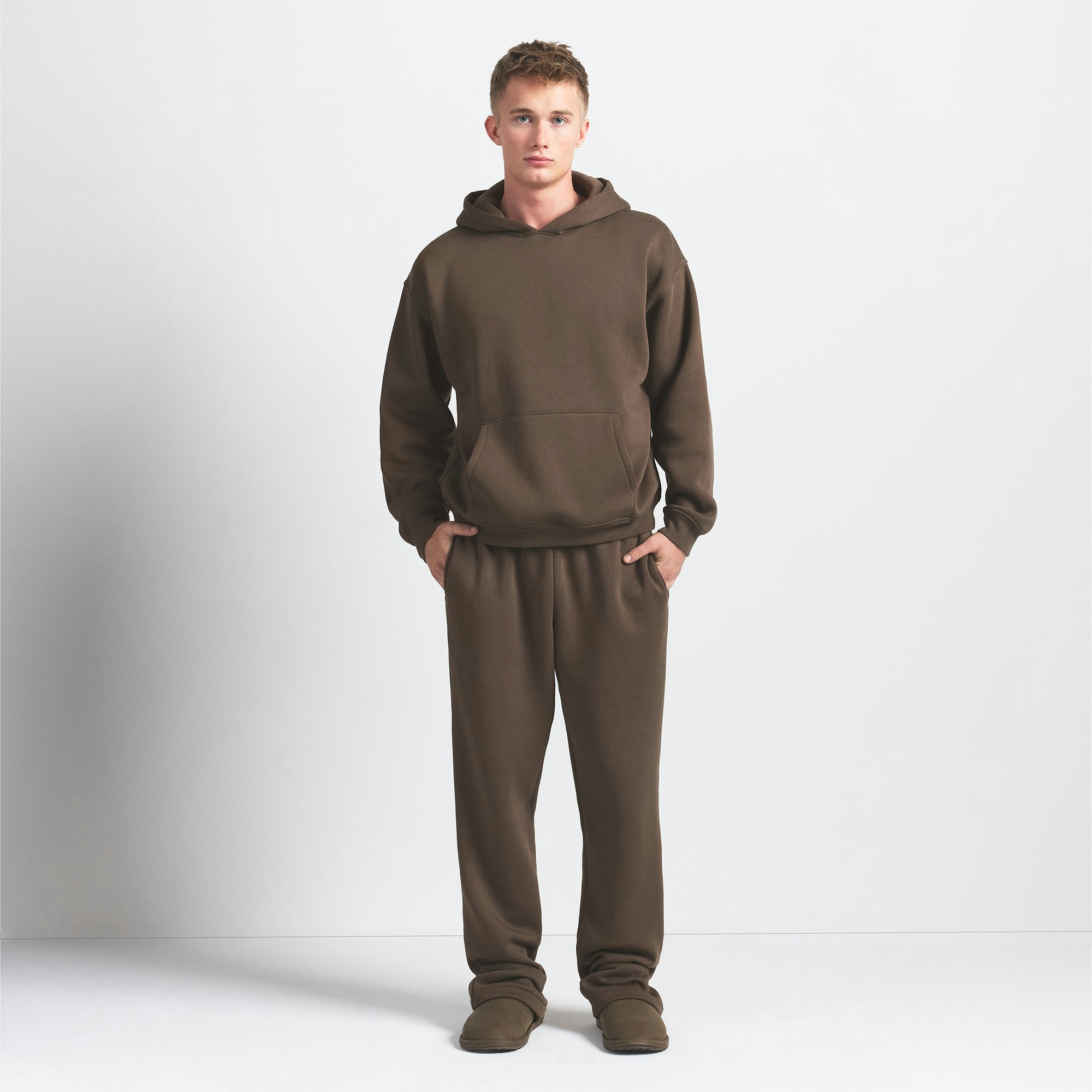 FLEECE LOUNGE MENS RELAXED HOODIE | DRIFTWOOD ON A MODEL FRONT VIEW @ | FOCUS: 0.0, 1.0, 0.9