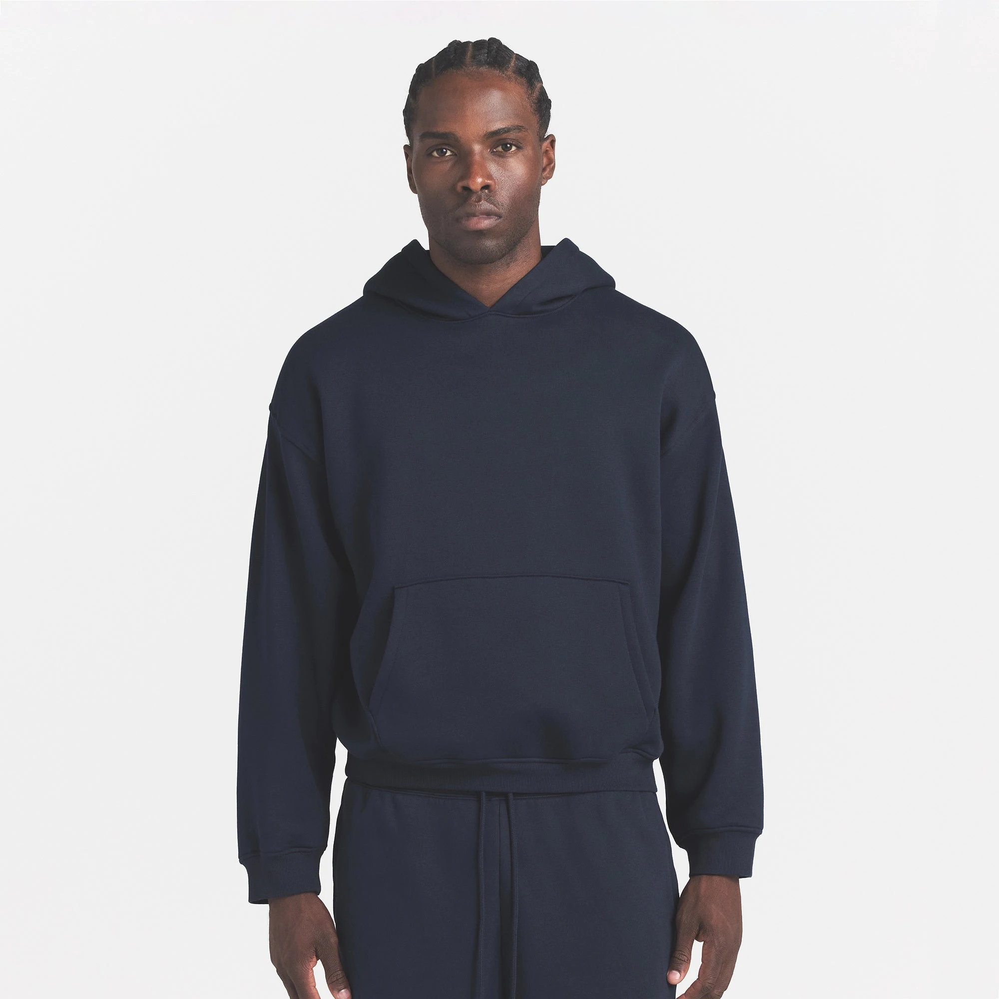 FLEECE LOUNGE MENS RELAXED HOODIE | NAVY ON A MODEL FRONT VIEW @ | FOCUS: 0.0, 1.0, 0.9