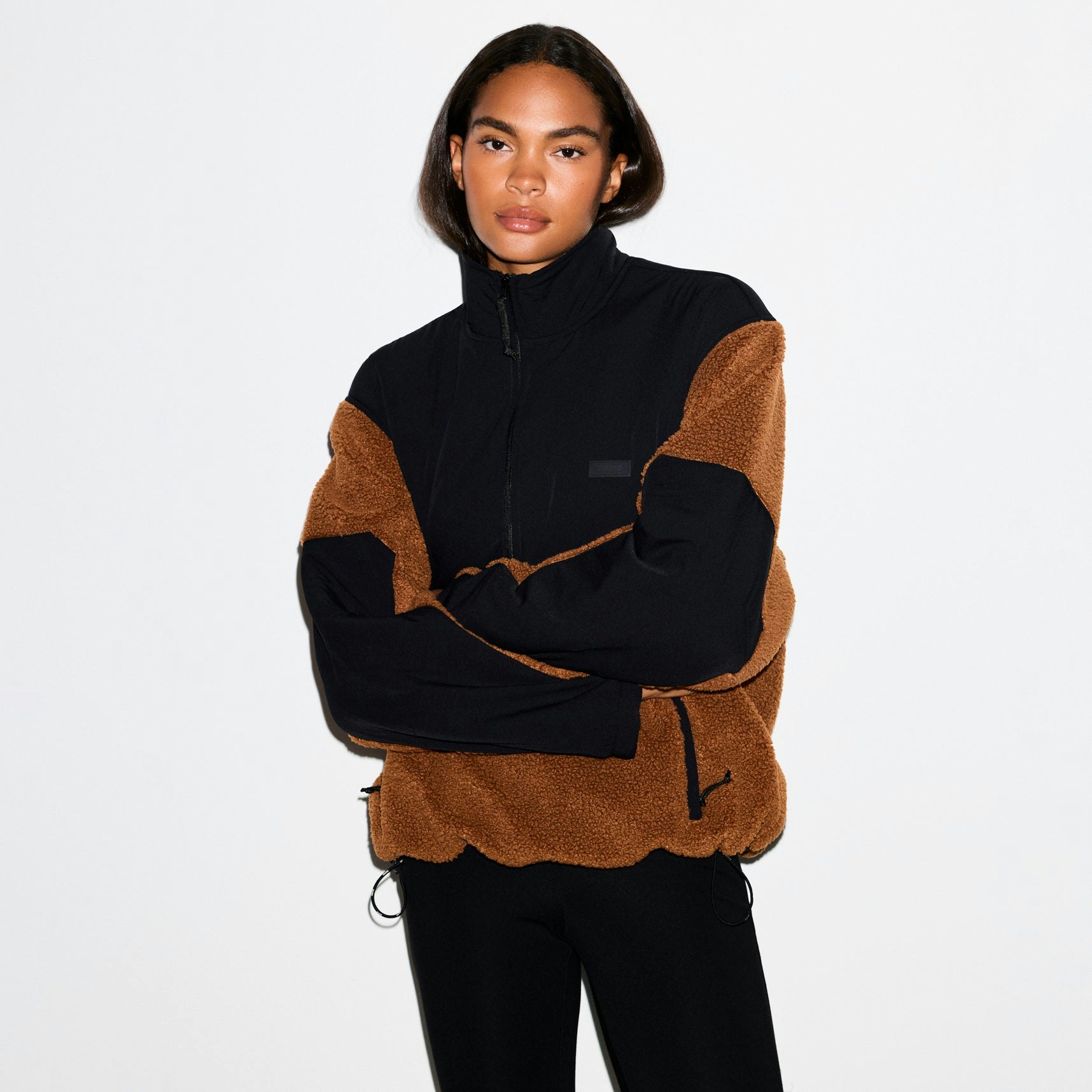 TEDDY OVERSIZED HALF ZIP UP PULLOVER | CHAI ON A MODEL SIDE VIEW @ | FOCUS: 0.0, 1.0, 0.9
