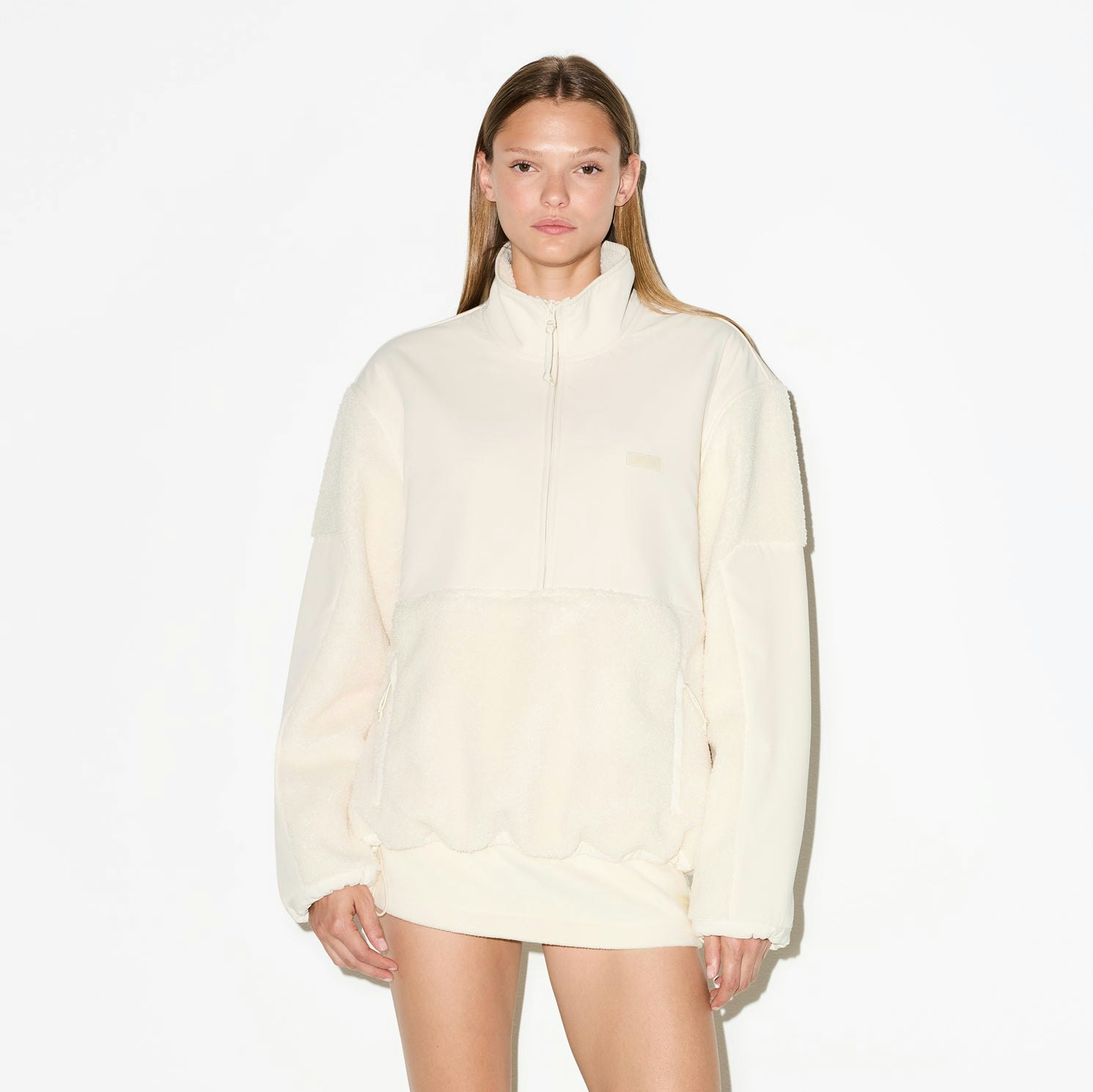 TEDDY HALF ZIP UP PULLOVER | ECRU ON A MODEL SIDE VIEW @ | FOCUS: 0.0, 1.0, 0.9