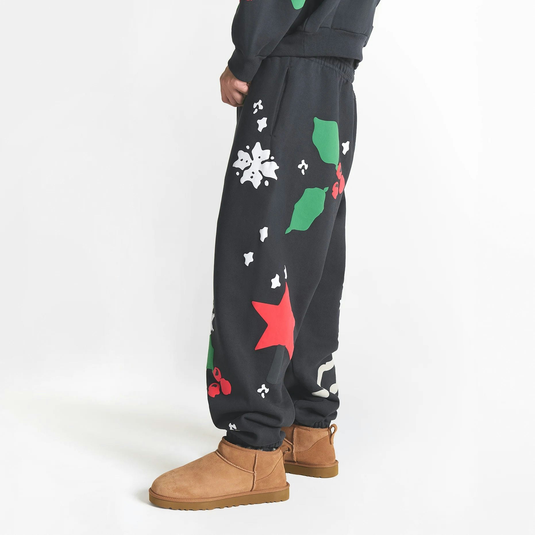 CACTUS PLANT FLEA MARKET X SKIMS HEAVYWEIGHT FLEECE MENS RELAXED ZIP UP HOODIE | ONYX TEDDY BEAR PRINT ON A MODEL SIDE VIEW @ | FOCUS: 0.0, 1.0, 0.9