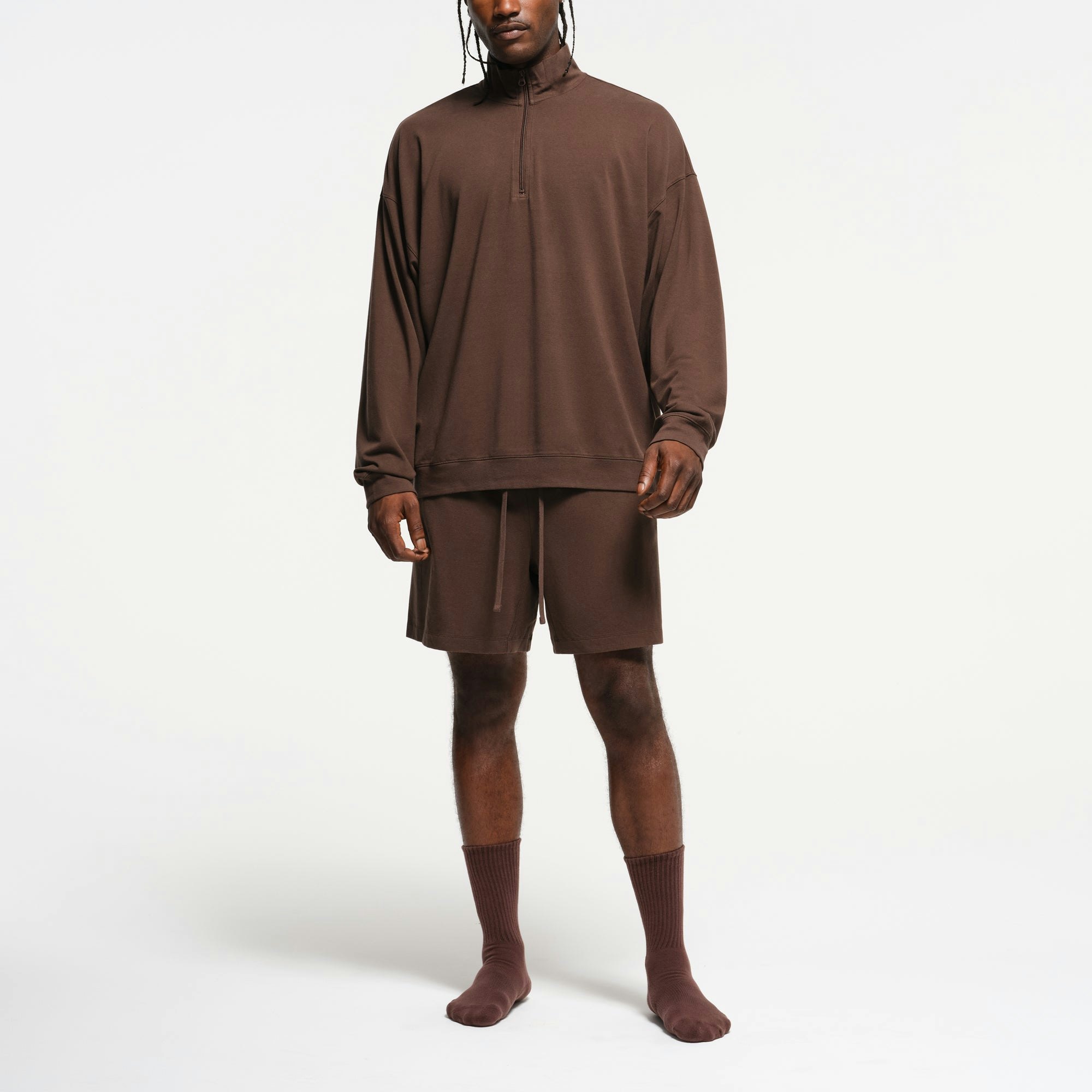 JERSEY LOUNGE MENS RELAXED QUARTER ZIP PULLOVER | MUD ON A MODEL FRONT VIEW