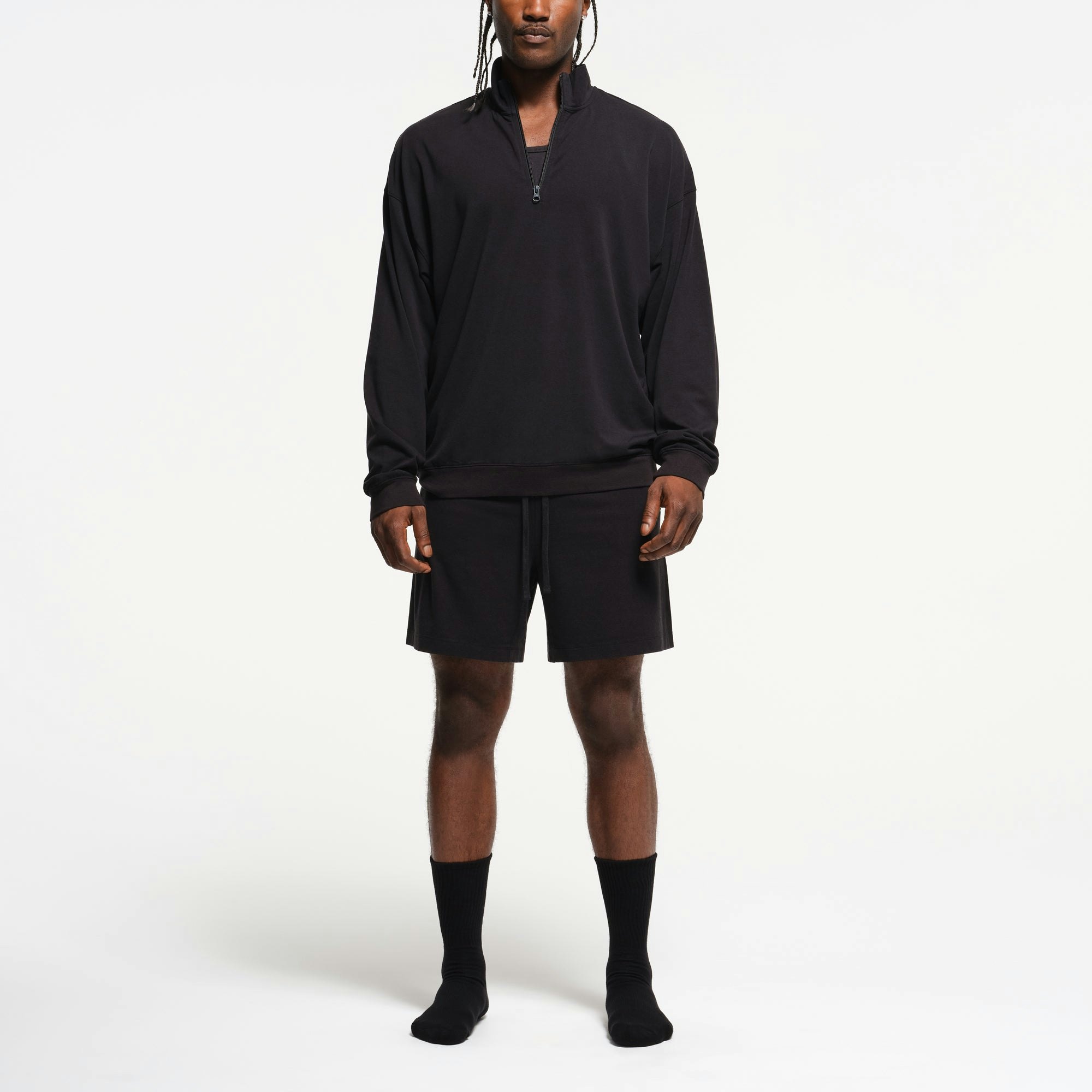 JERSEY LOUNGE MENS RELAXED QUARTER ZIP PULLOVER | OBSIDIAN ON A MODEL FRONT VIEW | FOCUS: 0.0, 1.0, 0.9