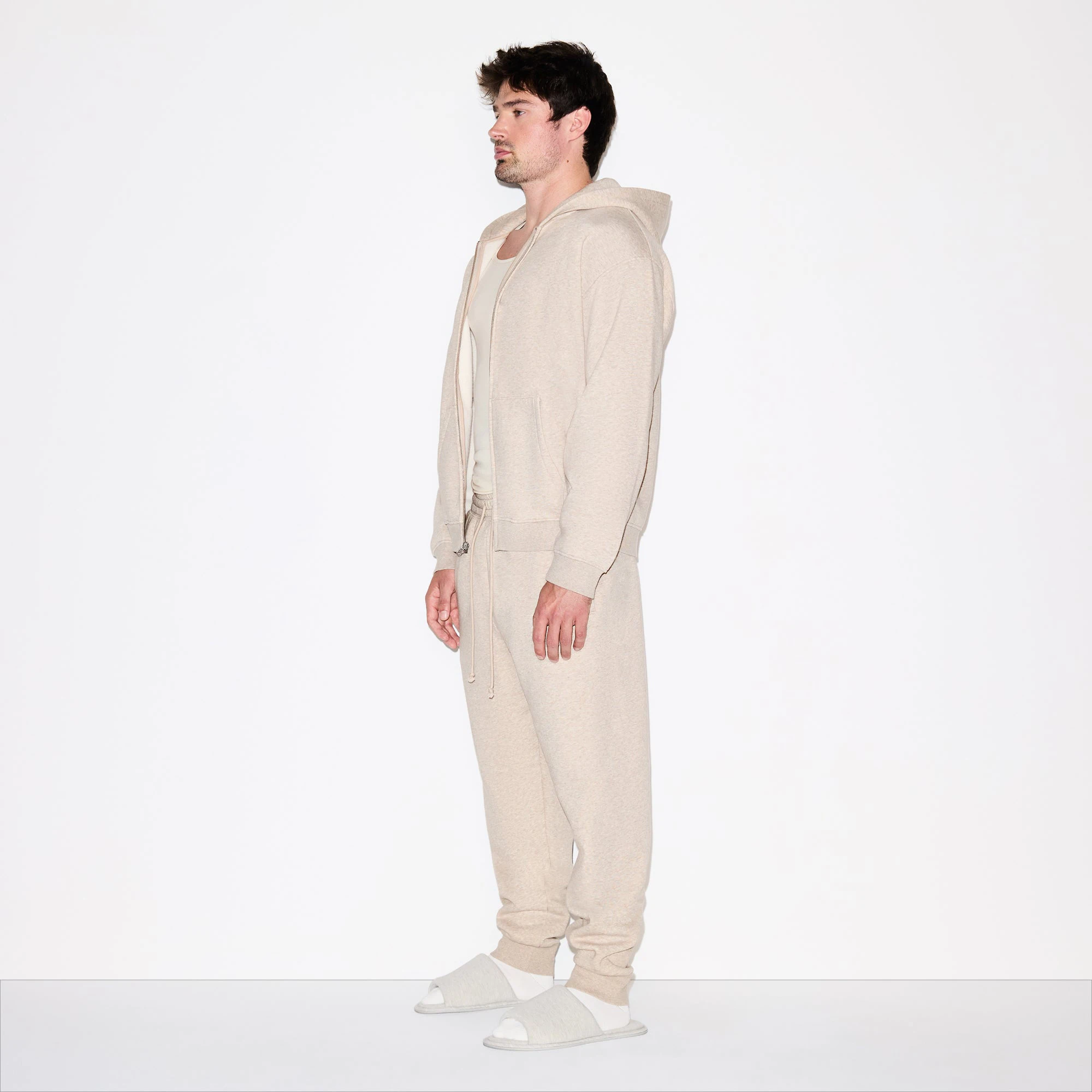 FLEECE LOUNGE MENS RELAXED ZIP UP HOODIE | DESERT HEATHER ON A MODEL FRONT VIEW @ | FOCUS: 0.0, 1.0, 0.9