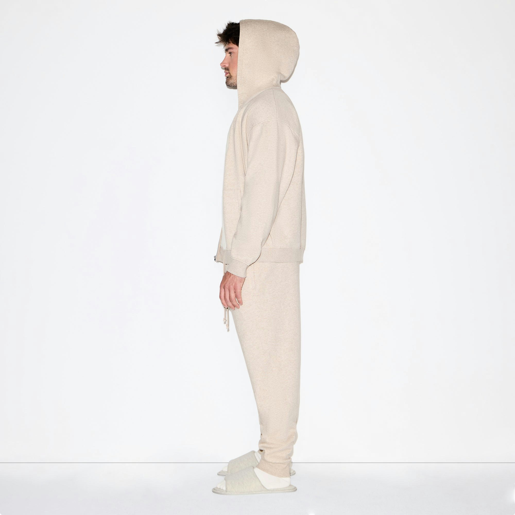 FLEECE LOUNGE MENS RELAXED ZIP UP HOODIE | DESERT HEATHER ON A MODEL FRONT VIEW @ | FOCUS: 0.0, 1.0, 0.9