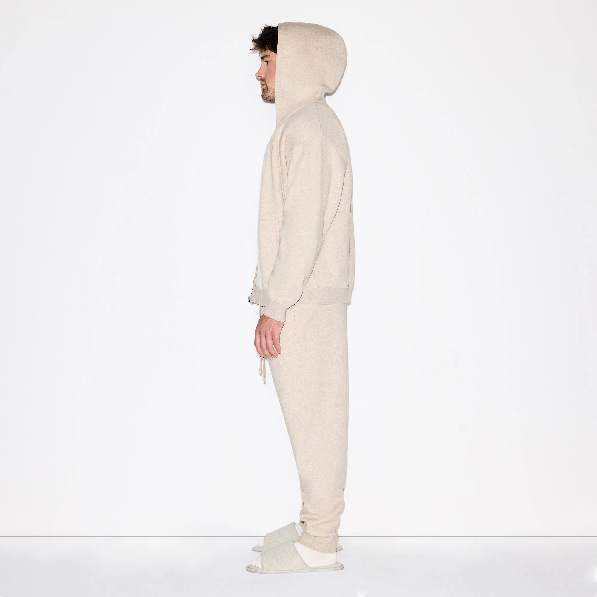 FLEECE LOUNGE MENS RELAXED ZIP UP HOODIE | DESERT HEATHER ON A MODEL FRONT VIEW @ | FOCUS: 0.0, 1.0, 0.9