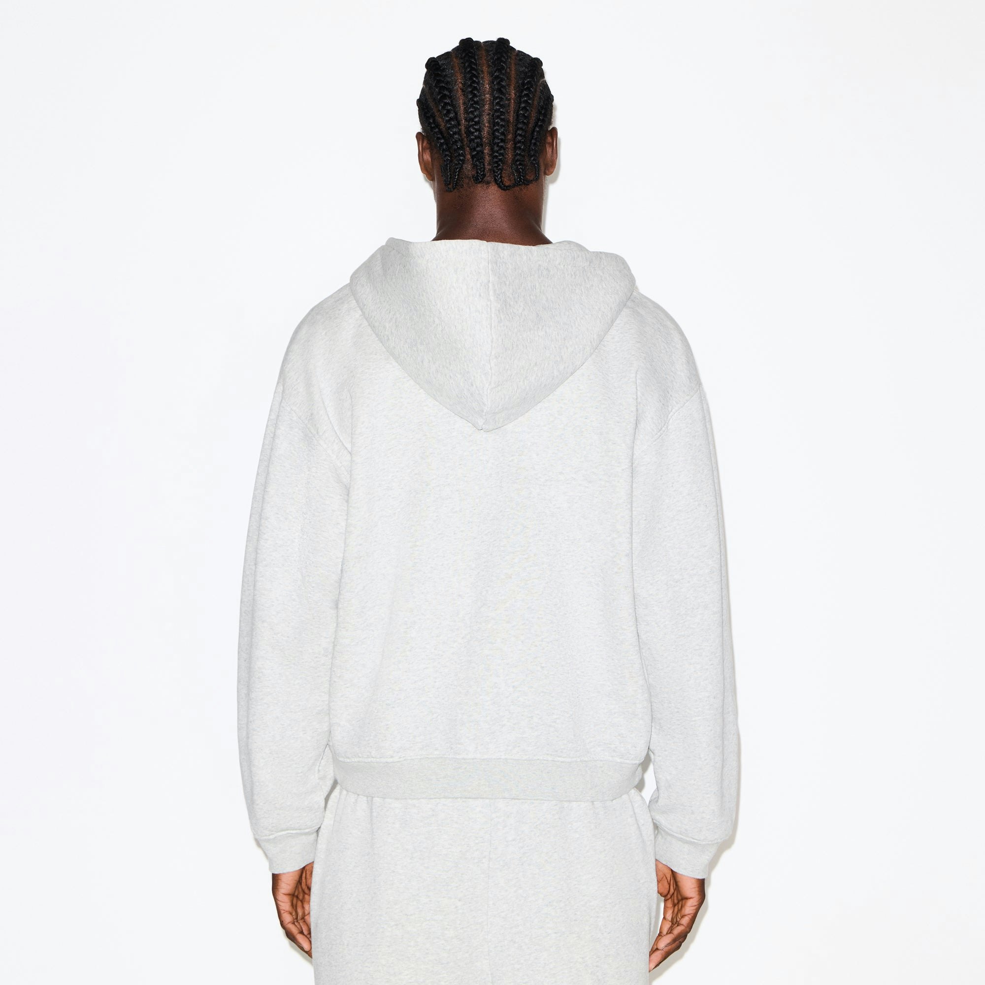 FLEECE LOUNGE MENS RELAXED ZIP UP HOODIE | LIGHT HEATHER GREY ON A MODEL SIDE VIEW @ | FOCUS: 0.0, 1.0, 0.9