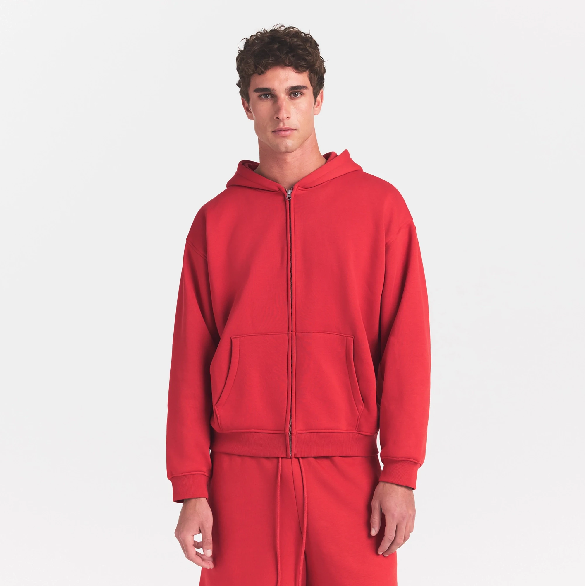 FLEECE LOUNGE MENS RELAXED ZIP UP HOODIE | WASHED RED ON A MODEL SIDE VIEW @ | FOCUS: 0.0, 1.0, 0.9