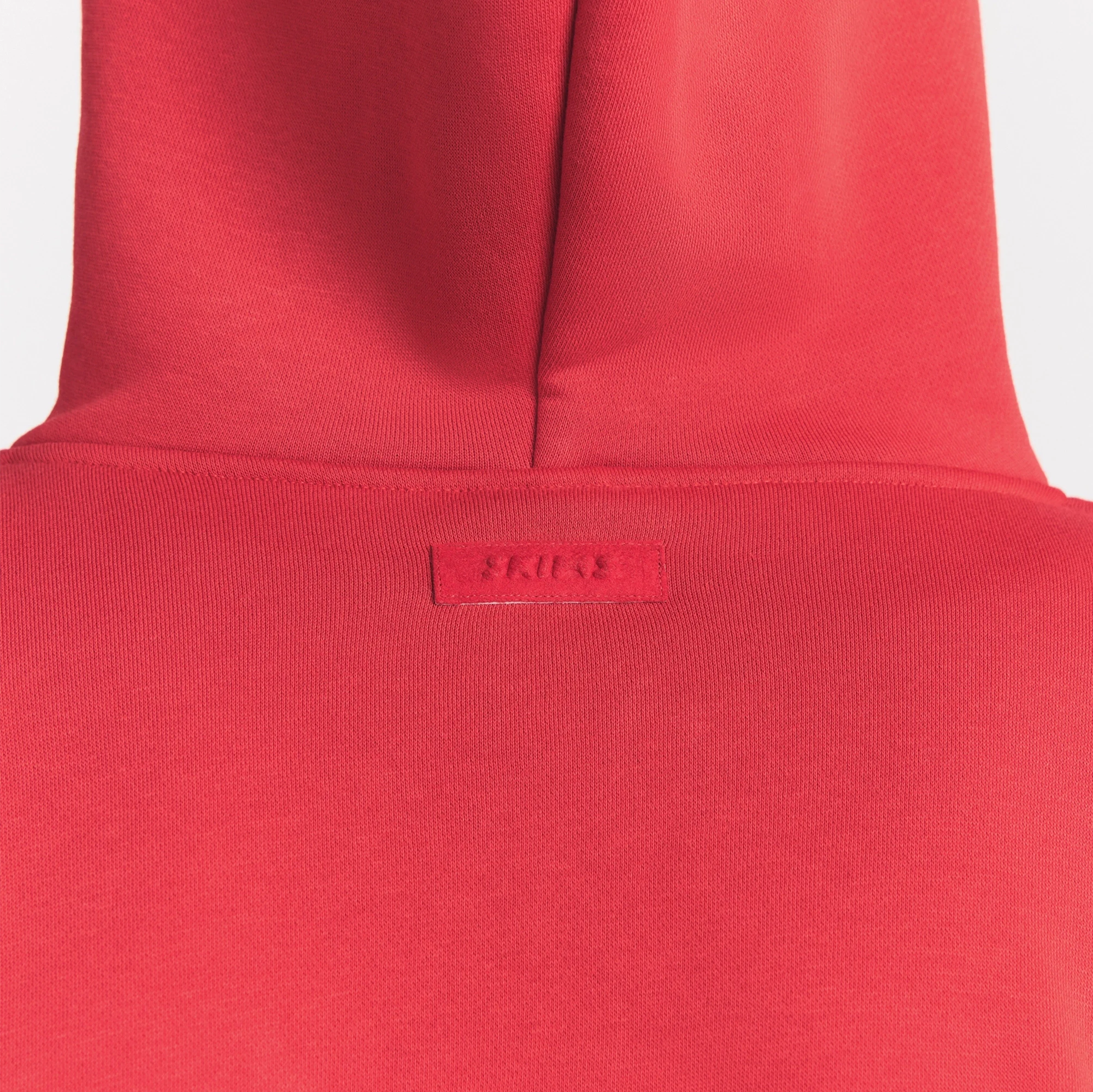 FLEECE LOUNGE MENS RELAXED ZIP UP HOODIE | WASHED RED ON A MODEL SIDE VIEW @ | FOCUS: 0.0, 1.0, 0.9