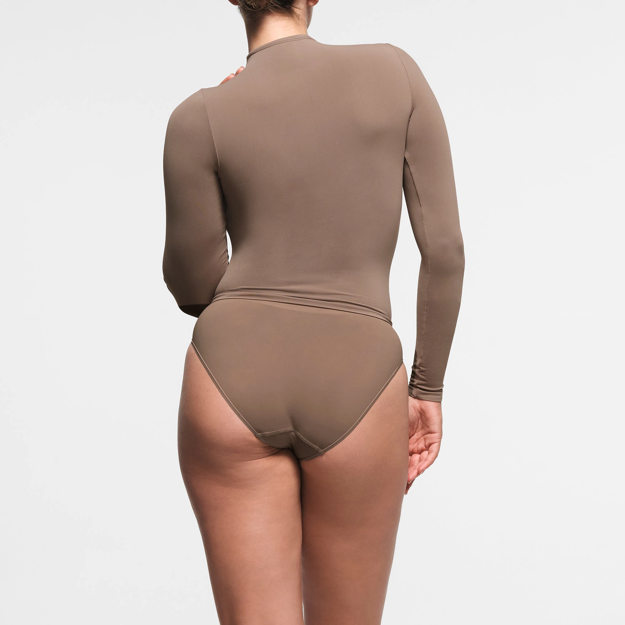 SOFT SMOOTHING SEAMLESS BRIEF | TRUFFLE ON A MODEL BACK VIEW