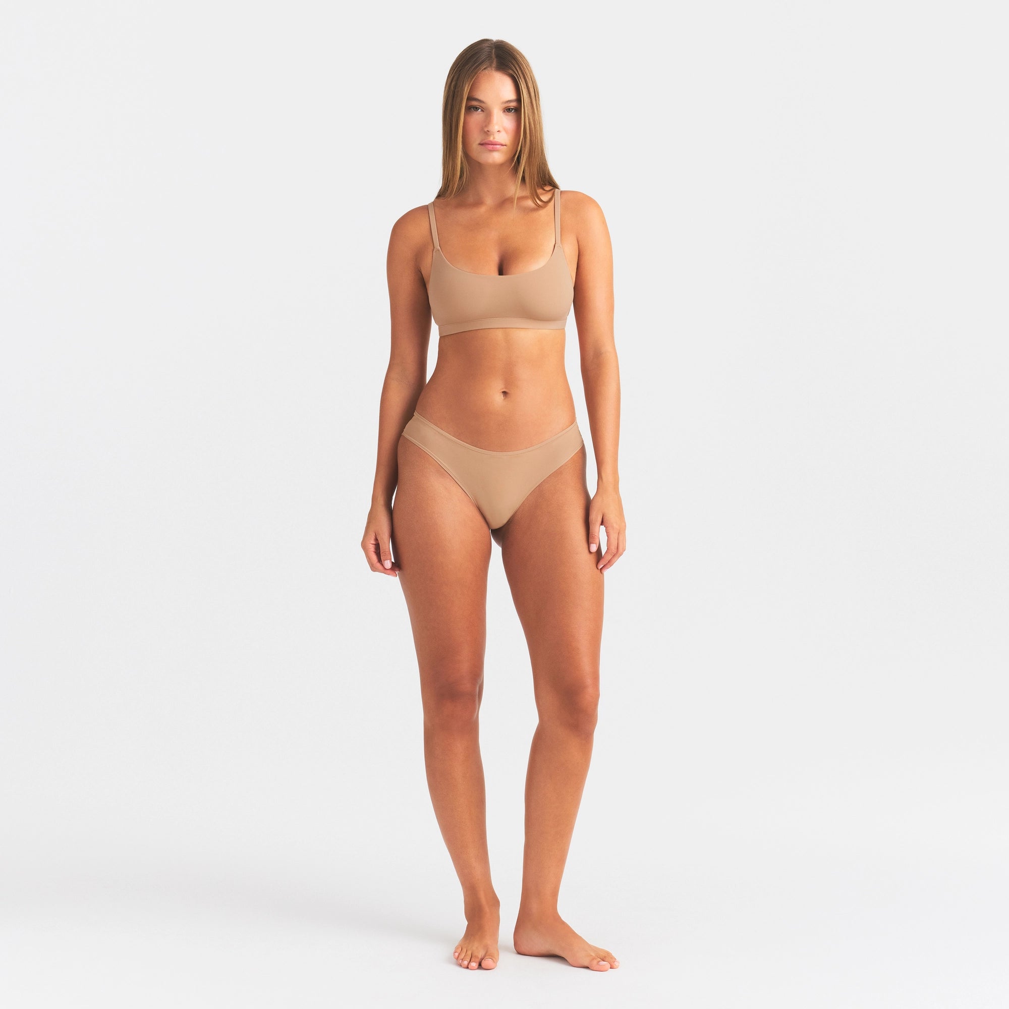 FITS EVERYBODY CHEEKY BRIEF | OCHRE ON A MODEL FRONT VIEW