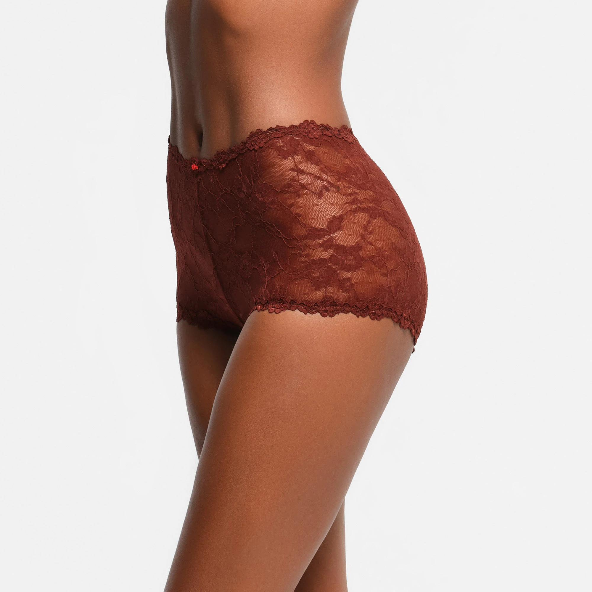 STRETCH LACE BOY SHORT | OXBLOOD CONTRAST ON A MODEL SIDE VIEW