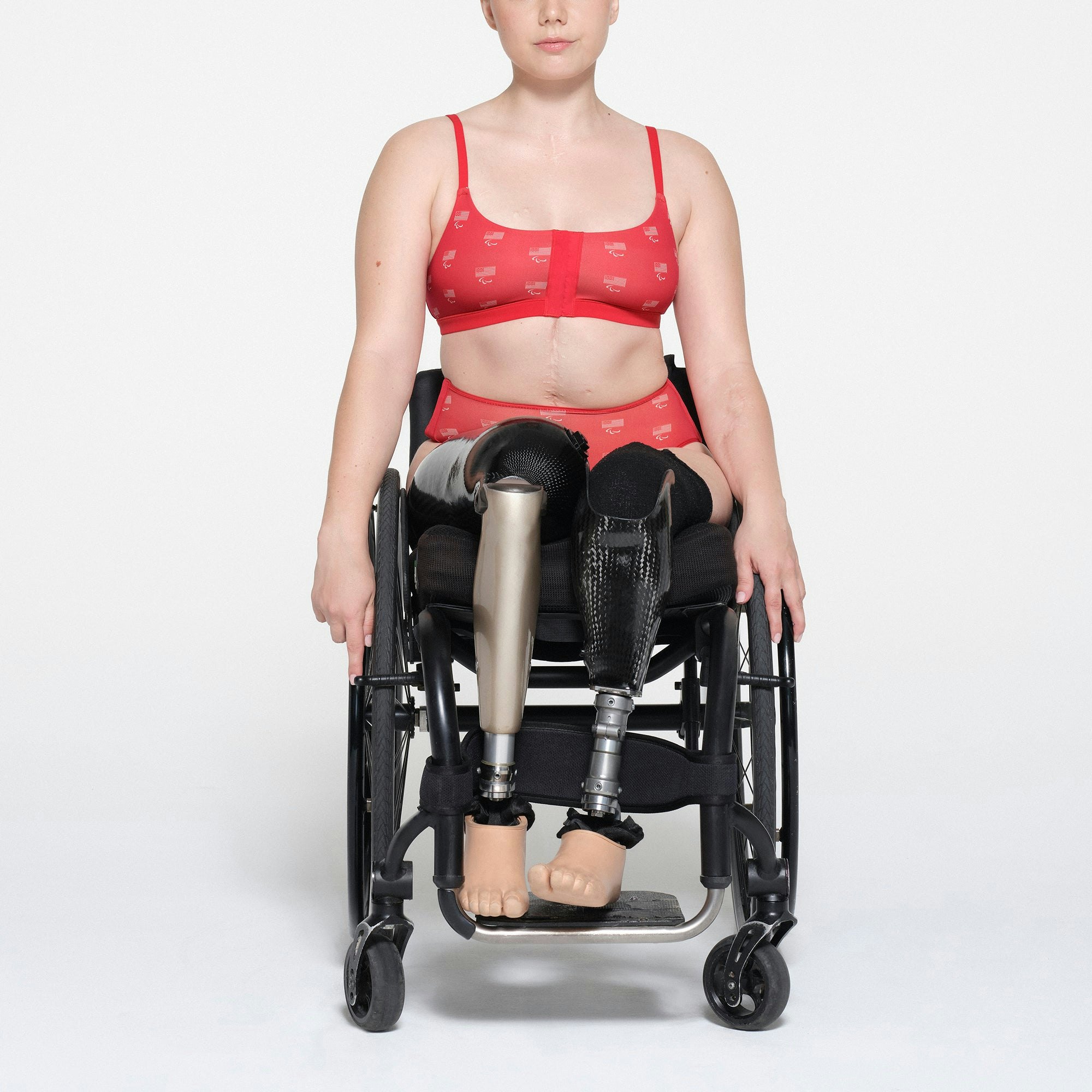 SKIMS FOR TEAM USA FITS EVERYBODY ADAPTIVE PARALYMPIC BOY SHORT | RED ON A MODEL FRONT VIEW | FOCUS: 0.1, 1, 0.9