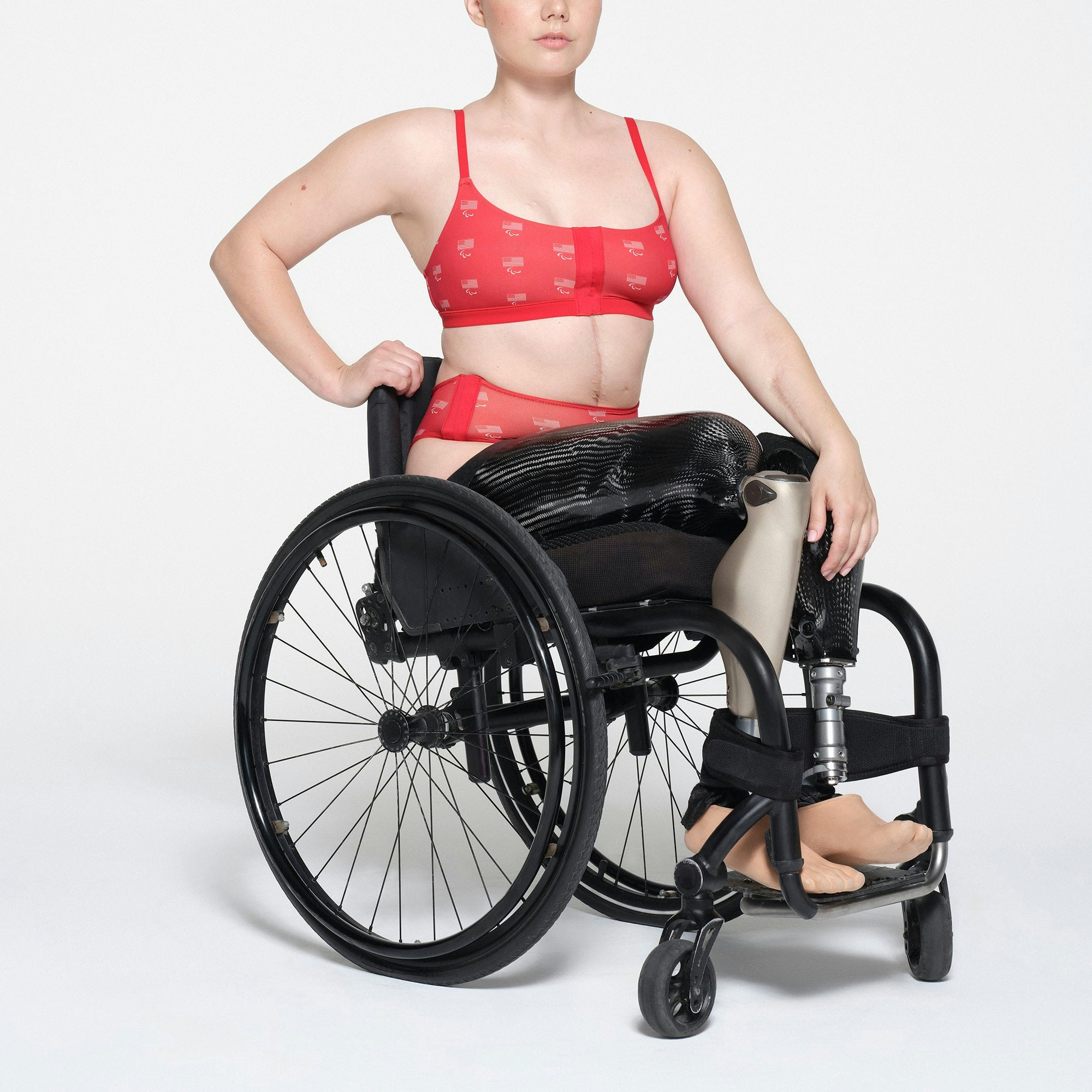 SKIMS FOR TEAM USA FITS EVERYBODY ADAPTIVE PARALYMPIC BOY SHORT | RED ON A MODEL SIDE VIEW