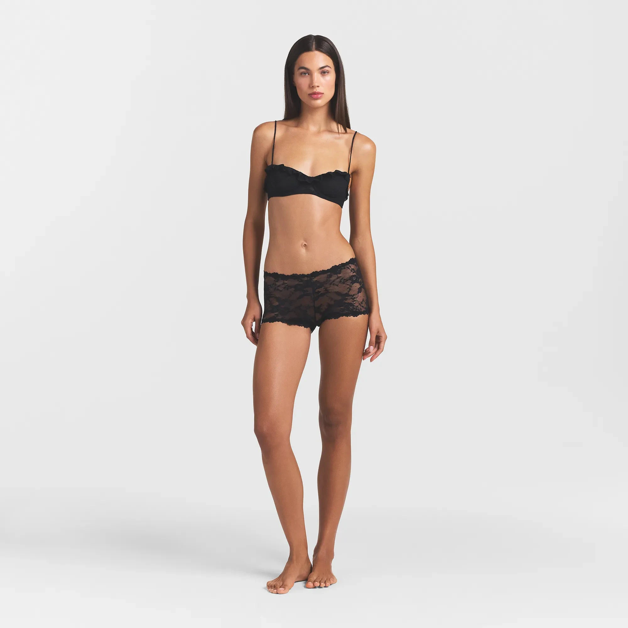 STRETCH LACE BOY SHORT | ONYX ON A MODEL FRONT VIEW