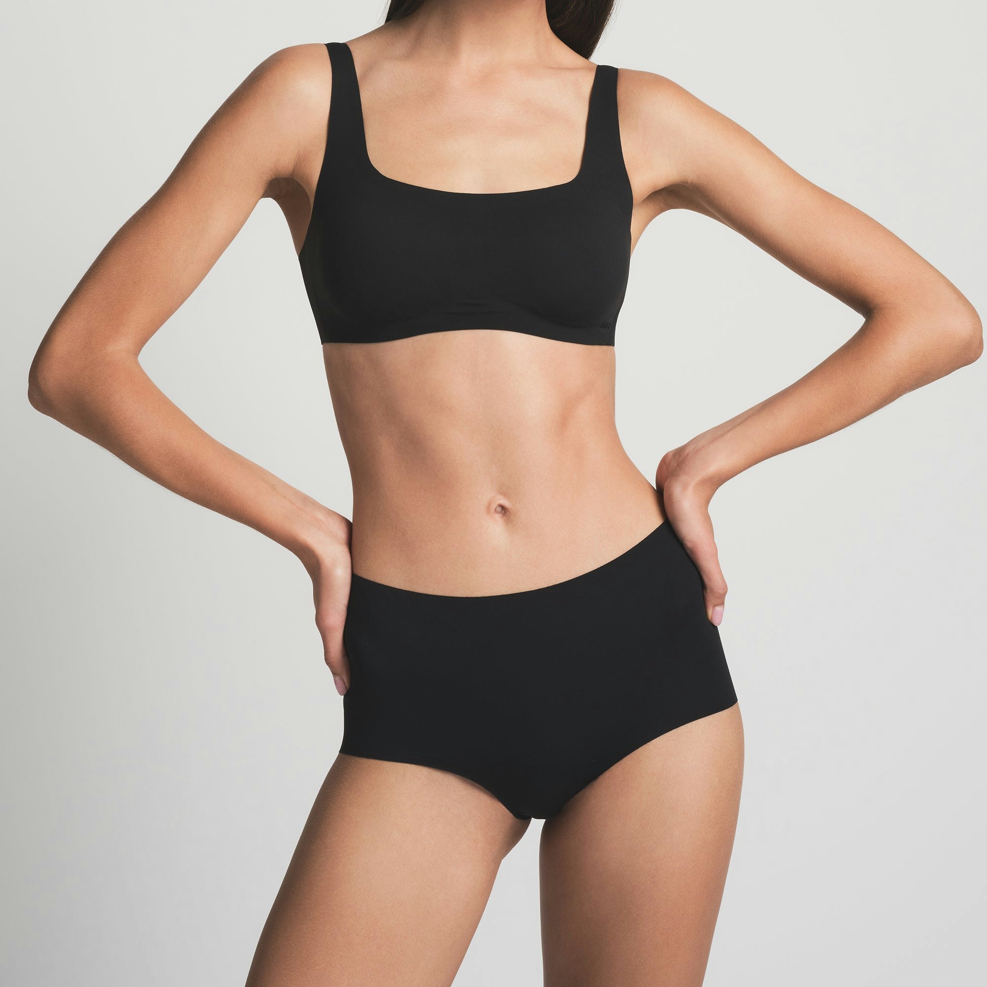 NAKED BOY SHORT | ONYX  ON A MODEL FRONT VIEW 