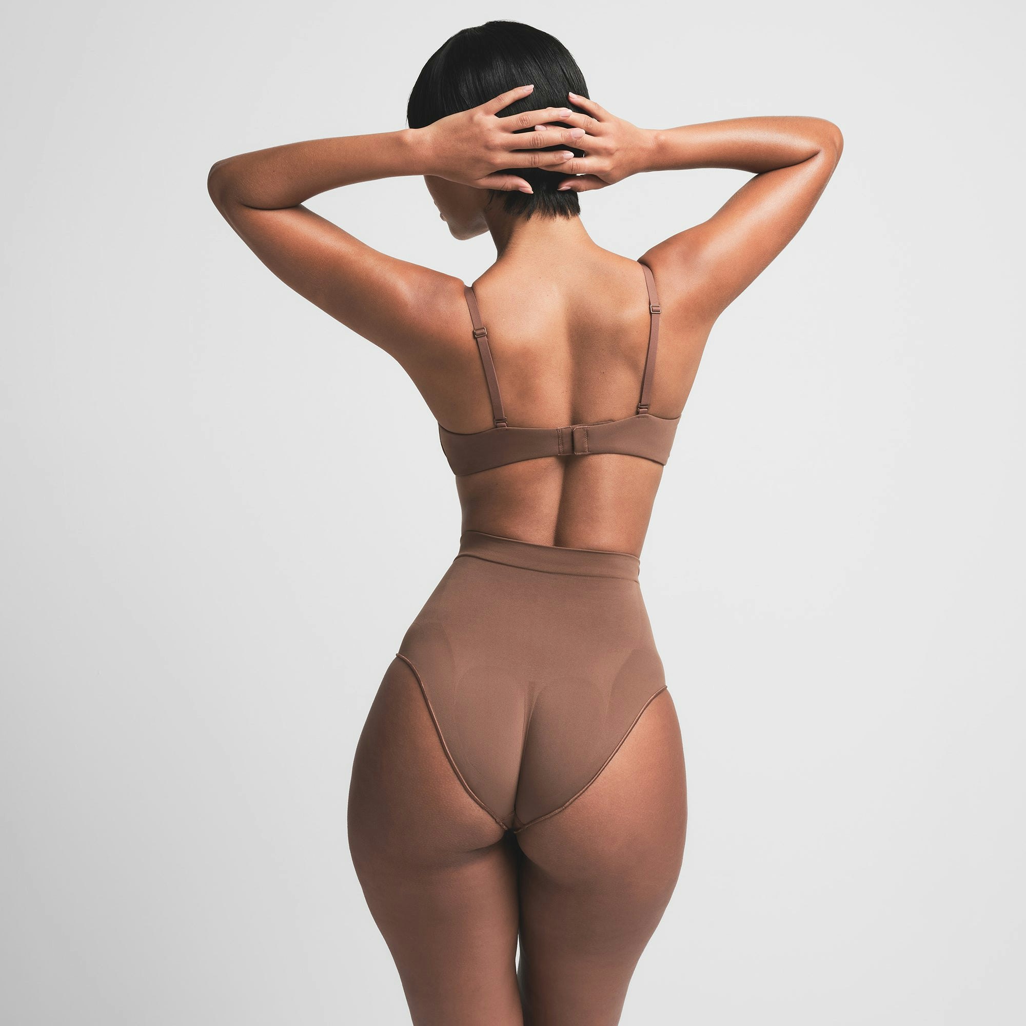 SEAMLESS SCULPT MID WAIST BRIEF | JASPER ON A MODEL BACK VIEW | FOCUS: 0.0, 1.0, 0.9