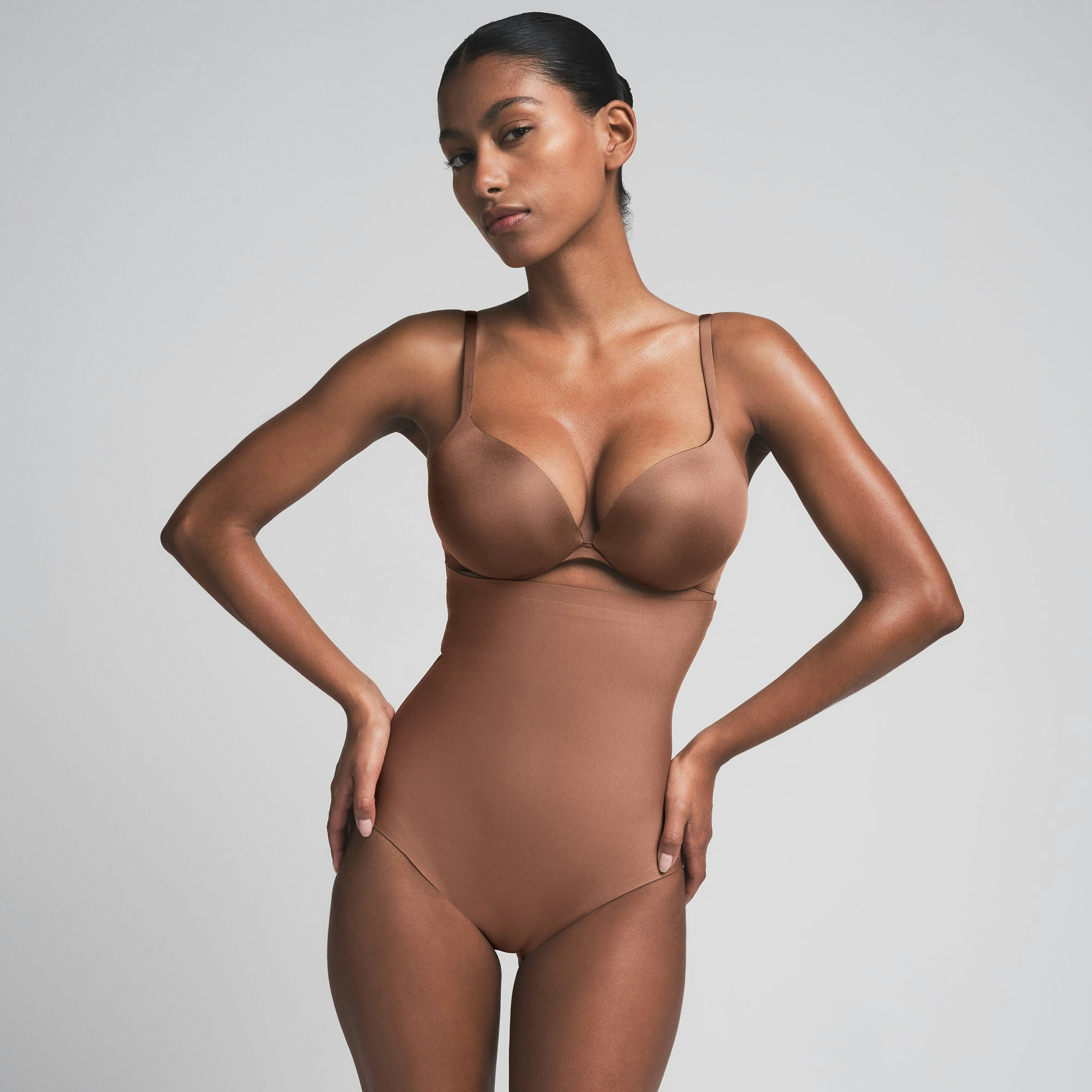 SKIMS BODY CORE SCULPT HIGH-WAISTED BRIEF | JASPER  ON A MODEL FRONT VIEW | FOCUS: 0.0, 1.0, 0.9