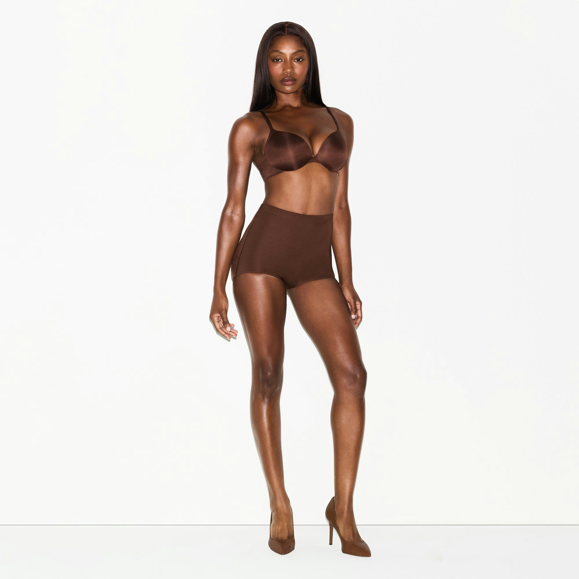 SKIMS BODY BUTT ENHANCING BRIEF | COCOA ON A MODEL FRONT VIEW @ | FOCUS: 0.0, 1.0, 0.9