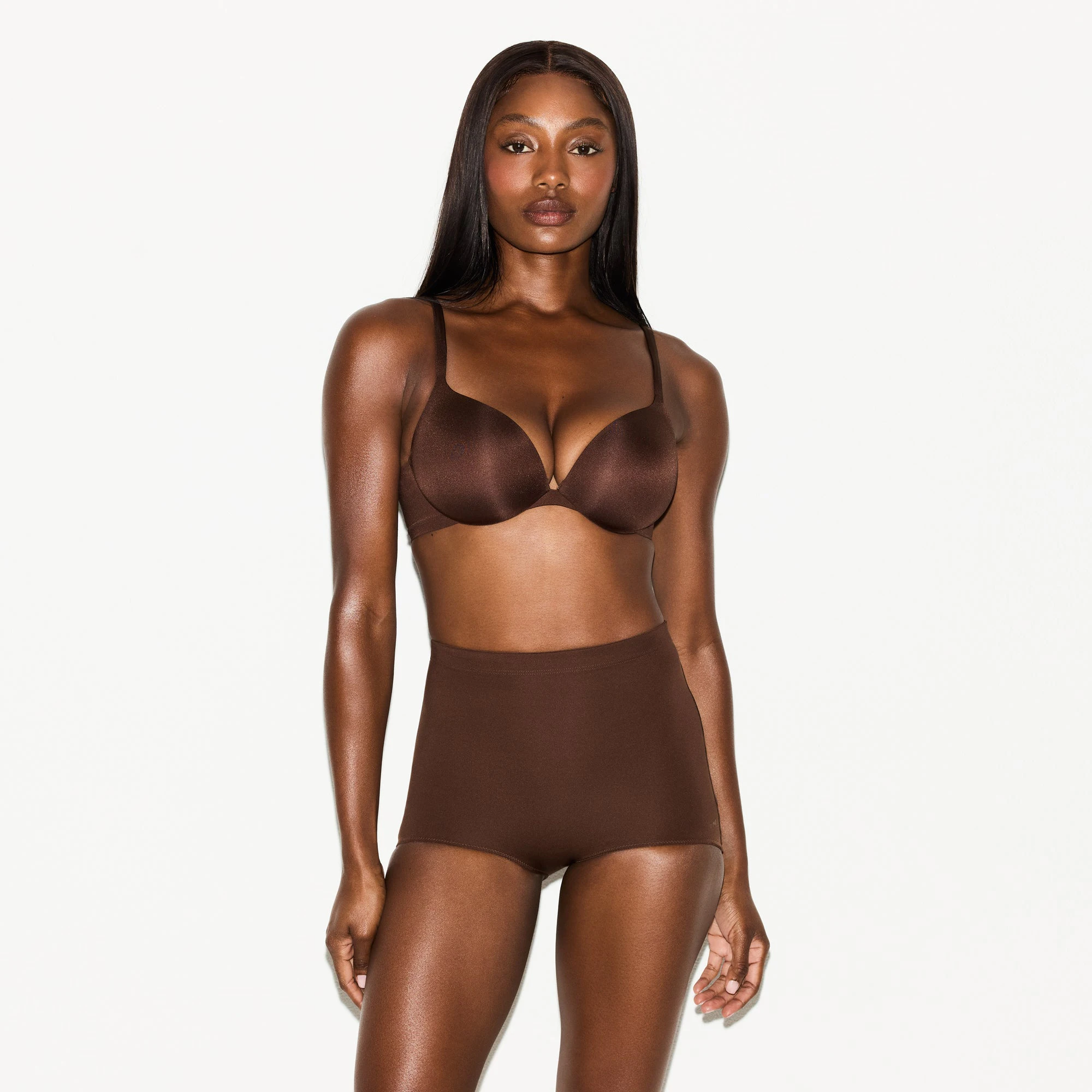 SKIMS BODY BUTT ENHANCING BRIEF | COCOA ON A MODEL SIDE VIEW @ | FOCUS: 0.0, 1.0, 0.9