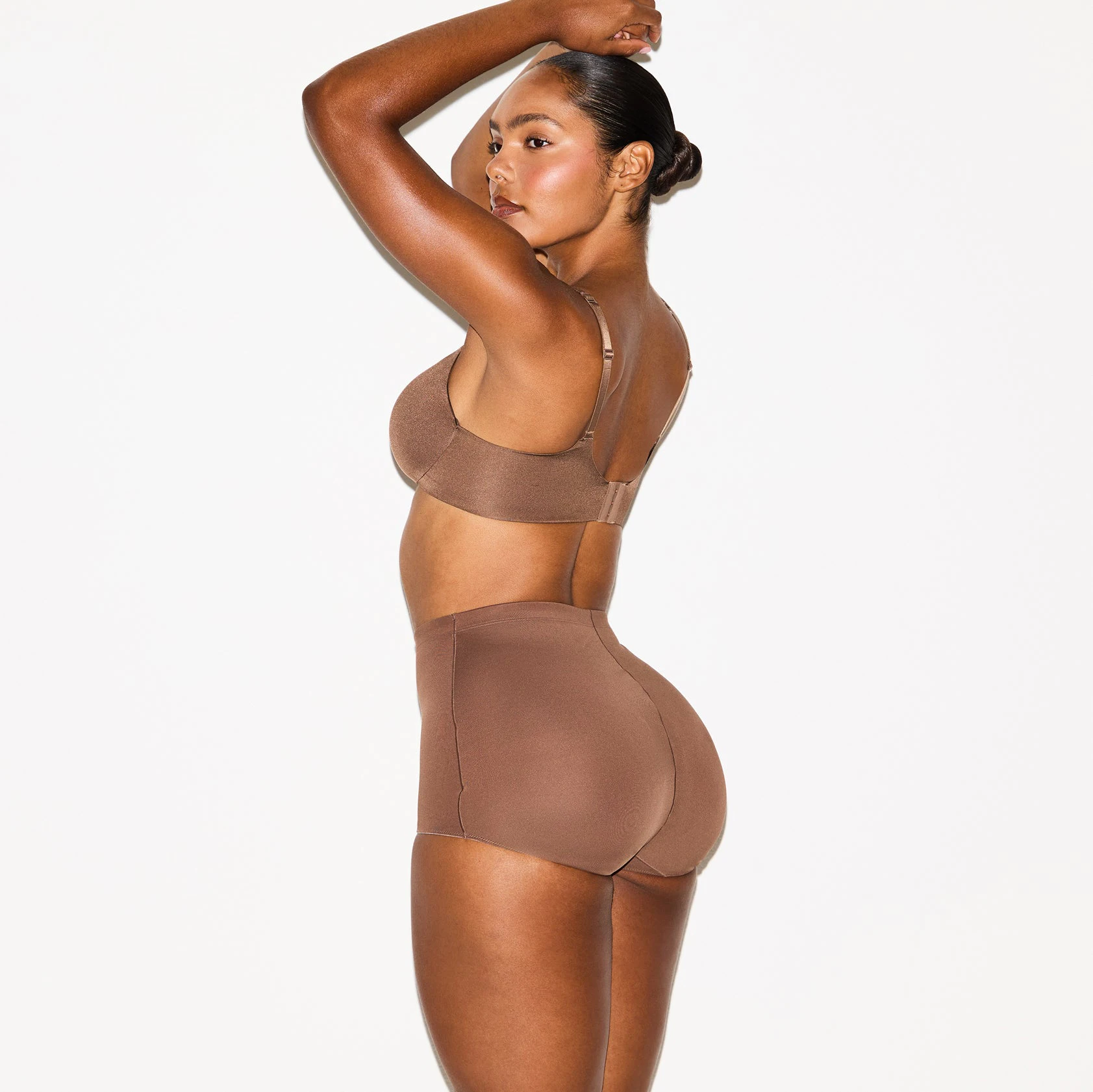 SKIMS BODY BUTT ENHANCING BRIEF | JASPER ON A MODEL SIDE VIEW @ | FOCUS: 0.0, 1.0, 0.9