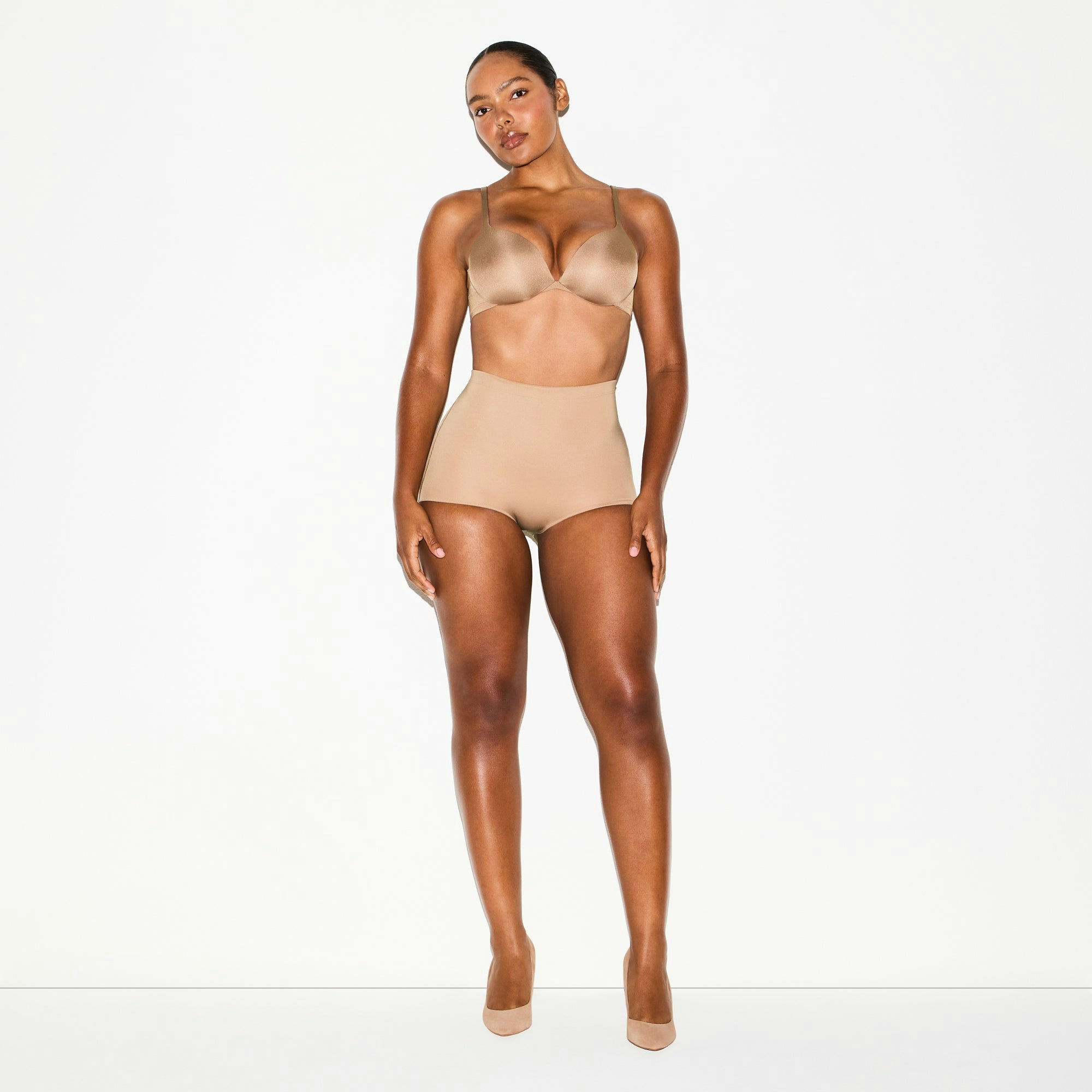 SKIMS BODY BUTT ENHANCING BRIEF | SIENNA ON A MODEL FRONT VIEW @ | FOCUS: 0.0, 1.0, 0.9