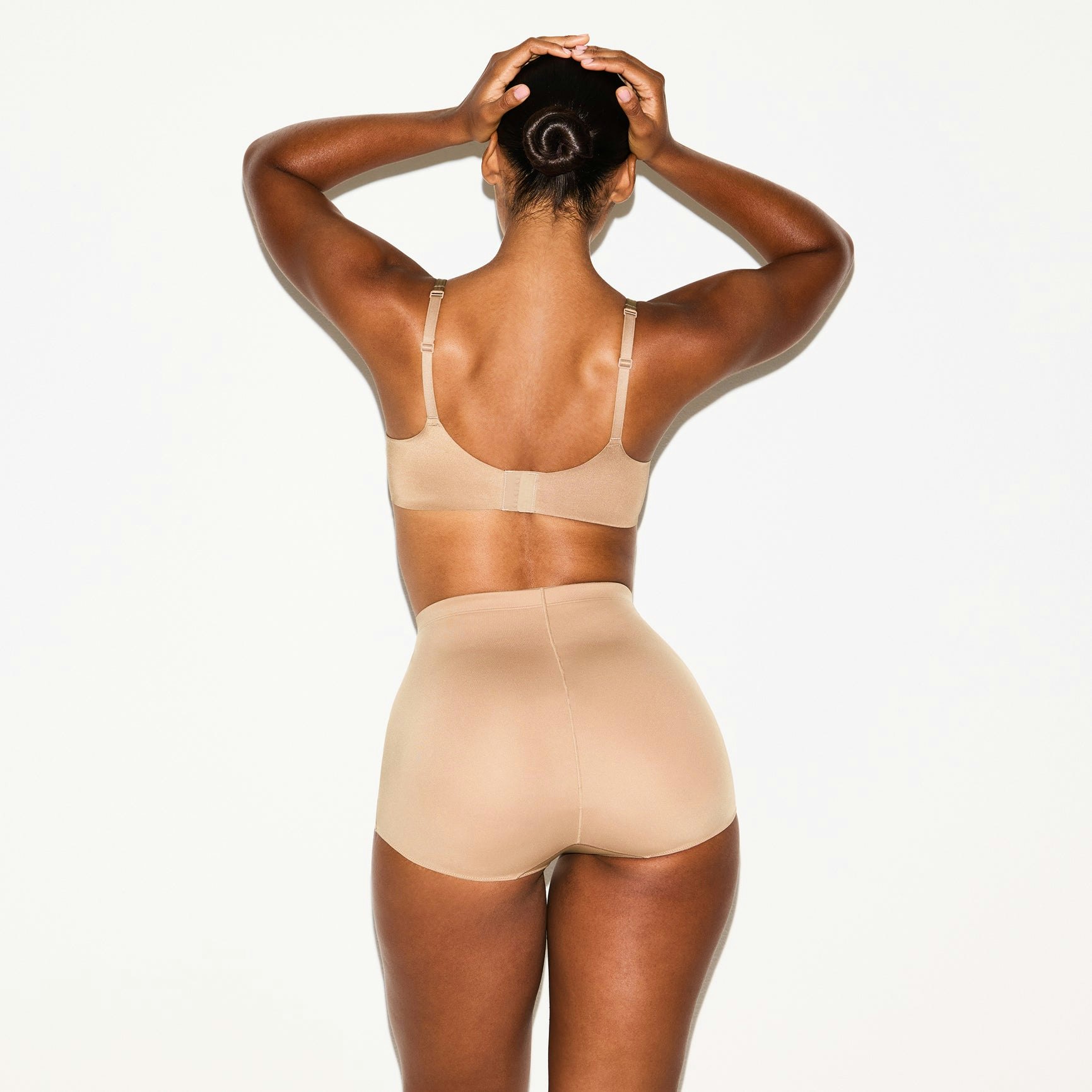 SKIMS BODY BUTT ENHANCING BRIEF | SIENNA ON A MODEL SIDE VIEW @ | FOCUS: 0.0, 1.0, 0.9