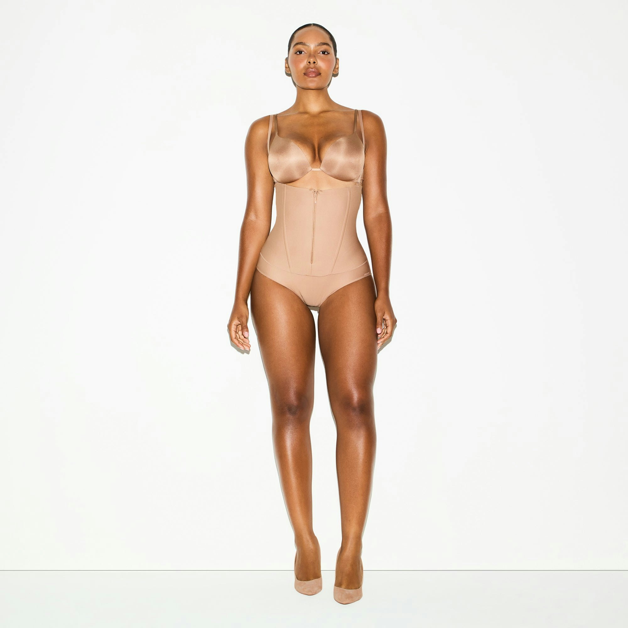 SKIMS BODY CORE SCULPT WAIST CINCHER BUTT LIFTING BRIEF | SIENNA ON A MODEL FRONT VIEW @ | FOCUS: 0.0, 1.0, 0.9