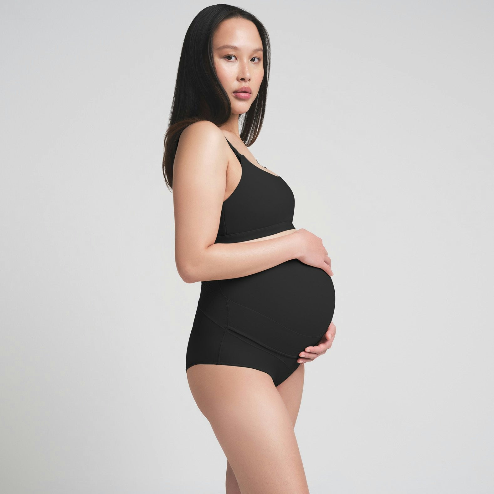 FITS EVERYBODY MATERNITY BANDED HIGH-WAISTED BRIEF | ONYX ON A MODEL SIDE VIEW | FOCUS: 0.0, 1.0, 0.9