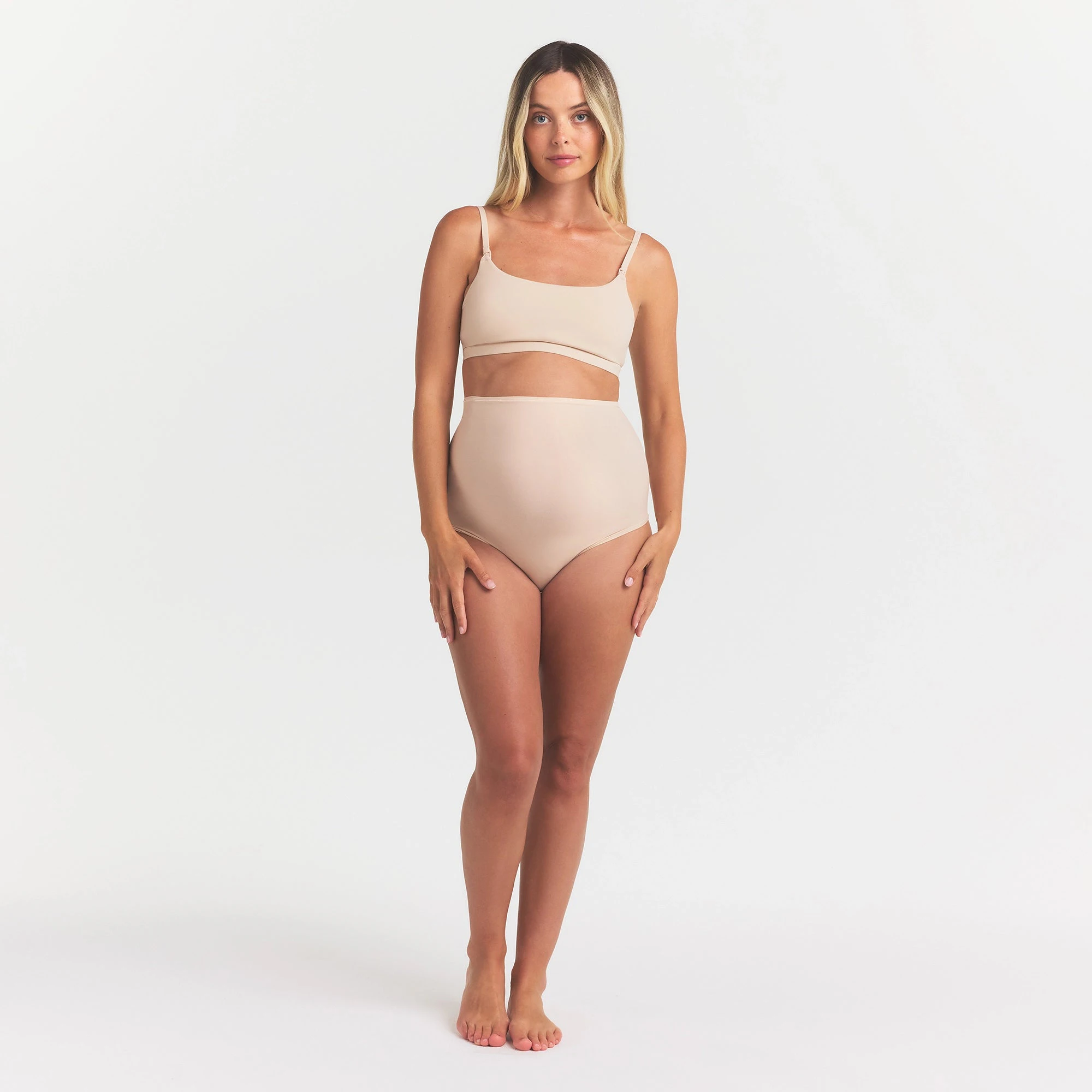 FITS EVERYBODY MATERNITY HIGH-WAISTED BRIEF | SAND ON A MODEL FRONT VIEW @ | FOCUS: 0.0, 1.0, 0.9