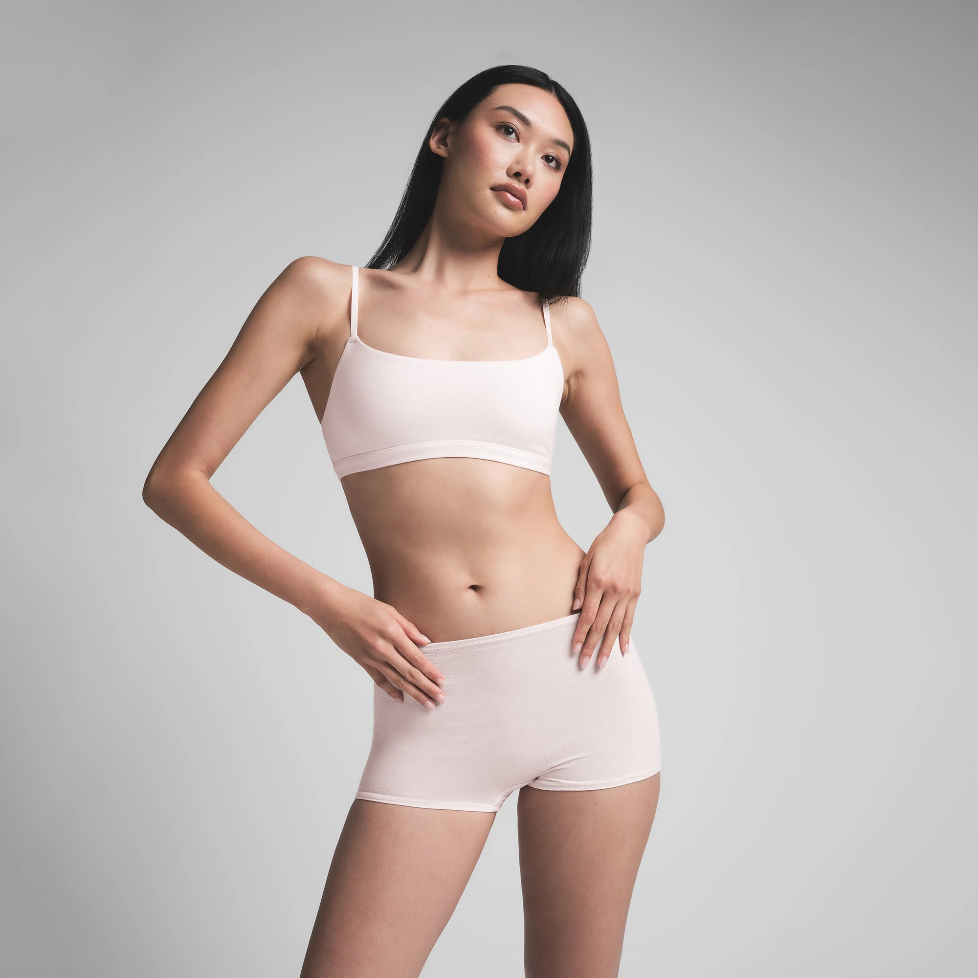 COTTON JERSEY BOY SHORT | BARELY PINK ON A MODEL FRONT VIEW | FOCUS: 0.0, 1.0, 0.9