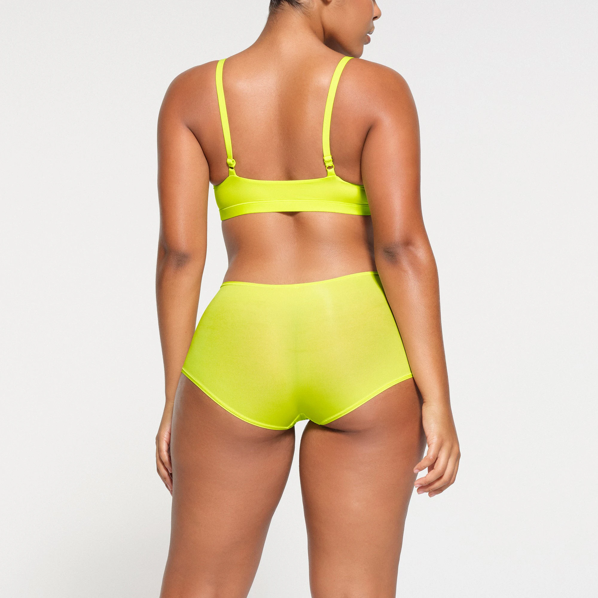 FITS EVERYBODY T SHIRT  LAYS FLAT ON A WHITE BACKGROUND