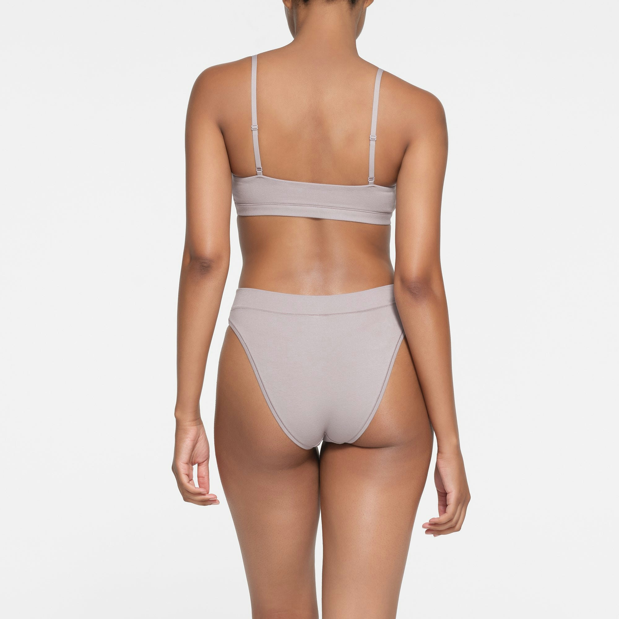 COTTON JERSEY CHEEKY TANGA | OYSTER ON A MODEL BACK VIEW