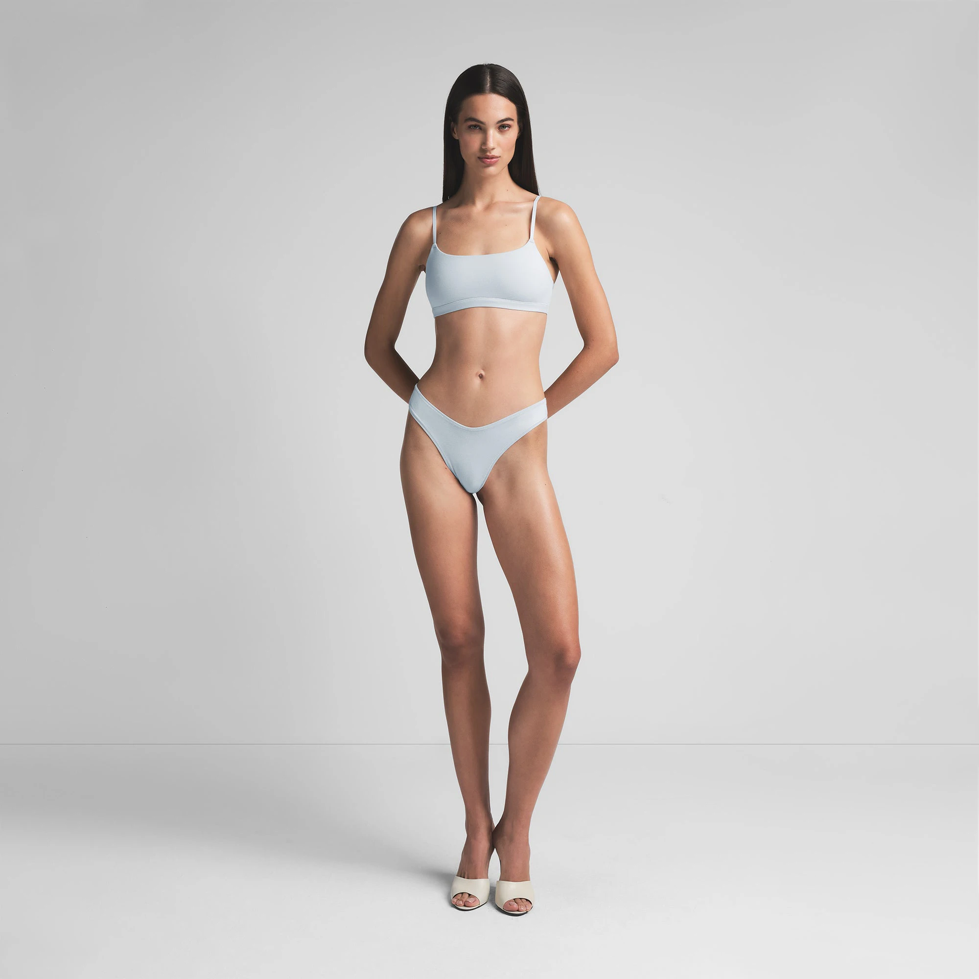 COTTON JERSEY DIPPED THONG | ZEN BLUE ON A MODEL FRONT VIEW | FOCUS: 0.0, 1.0, 0.9
