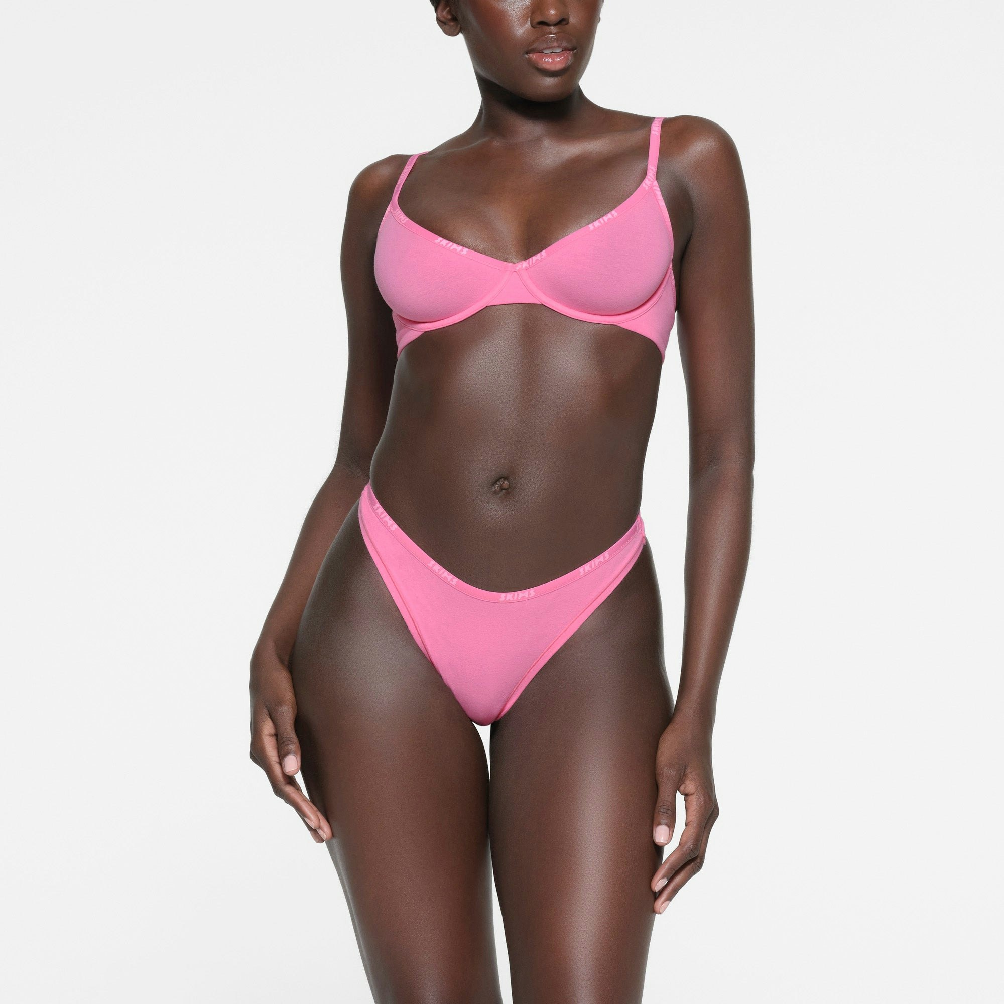 COTTON LOGO DIPPED THONG | SUGAR PINK ON A MODEL FRONT VIEW