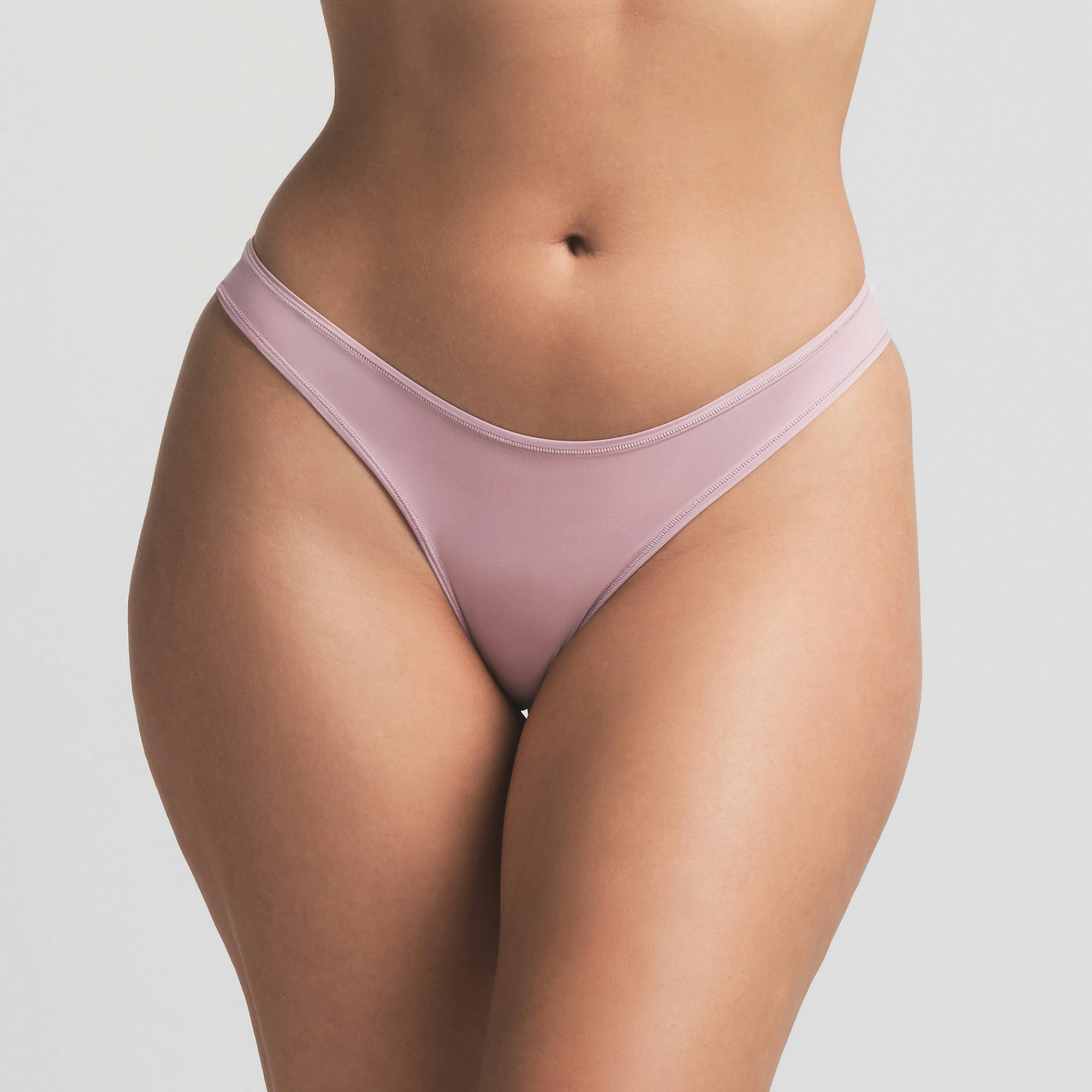 FITS EVERYBODY DIPPED FRONT THONG | DUSK ON A MODEL SIDE VIEW