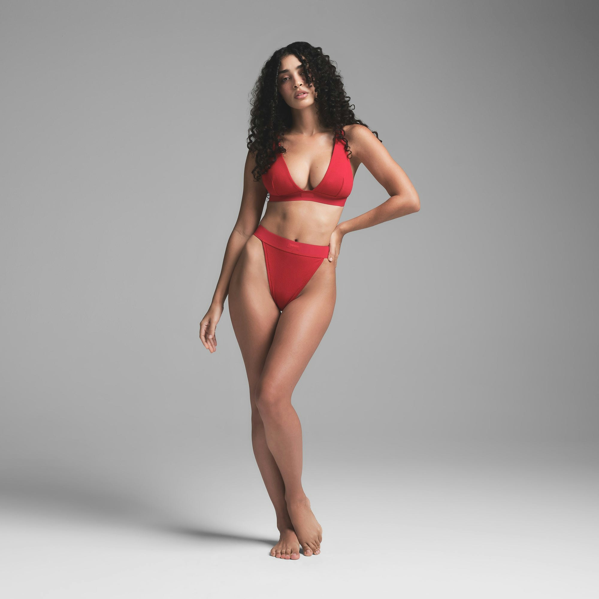 COTTON RIB THONG | CRANBERRY ON A MODEL FRONT VIEW