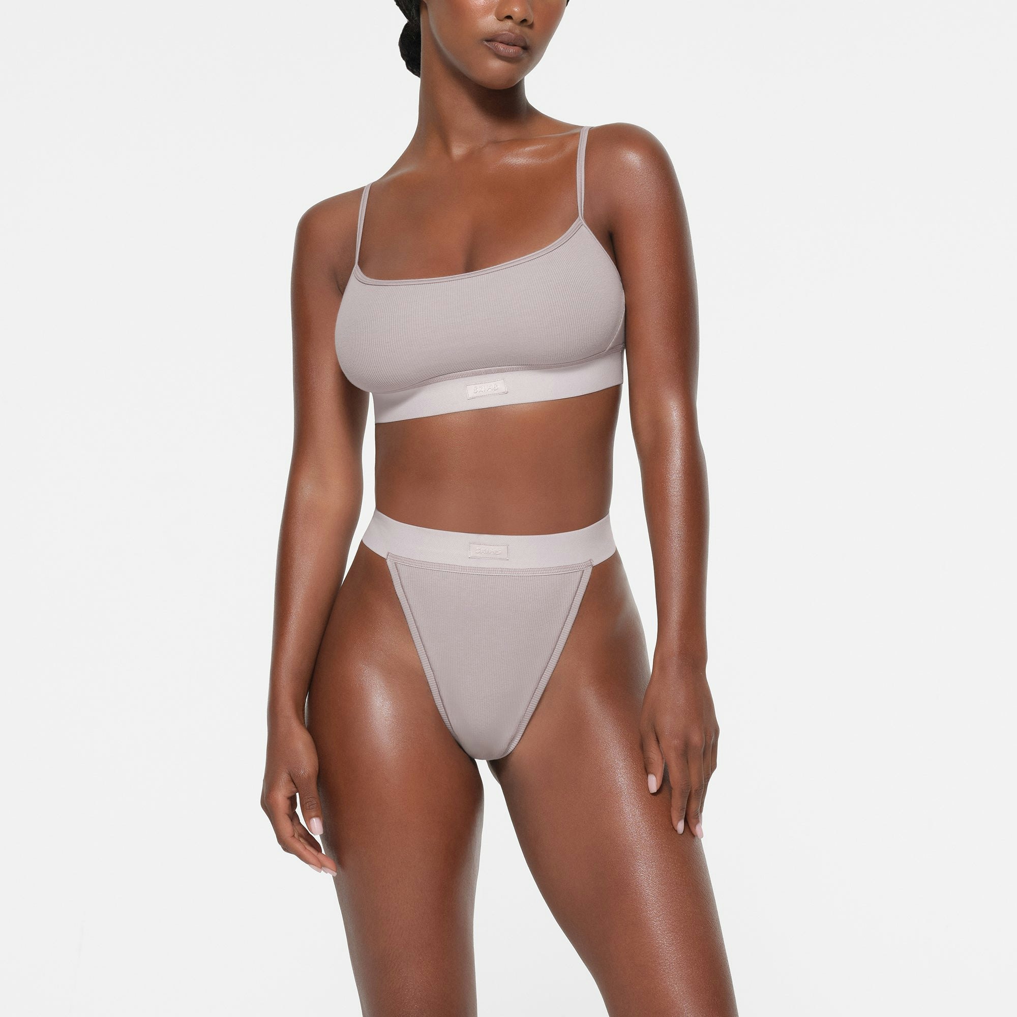 COTTON RIB THONG | OYSTER ON A MODEL FRONT VIEW