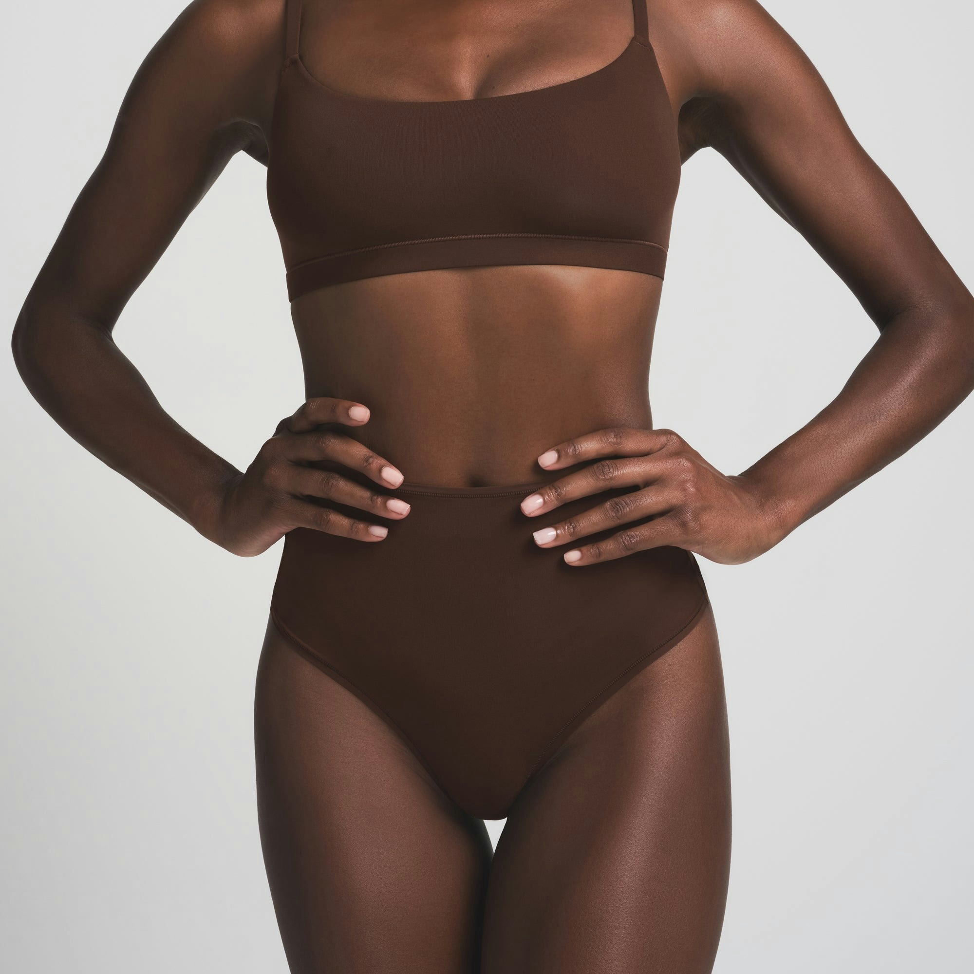 FITS EVERYBODY HIGH-WAISTED THONG | COCOA ON A MODEL FRONT VIEW | FOCUS: 0.0, 1.0, 0.9
