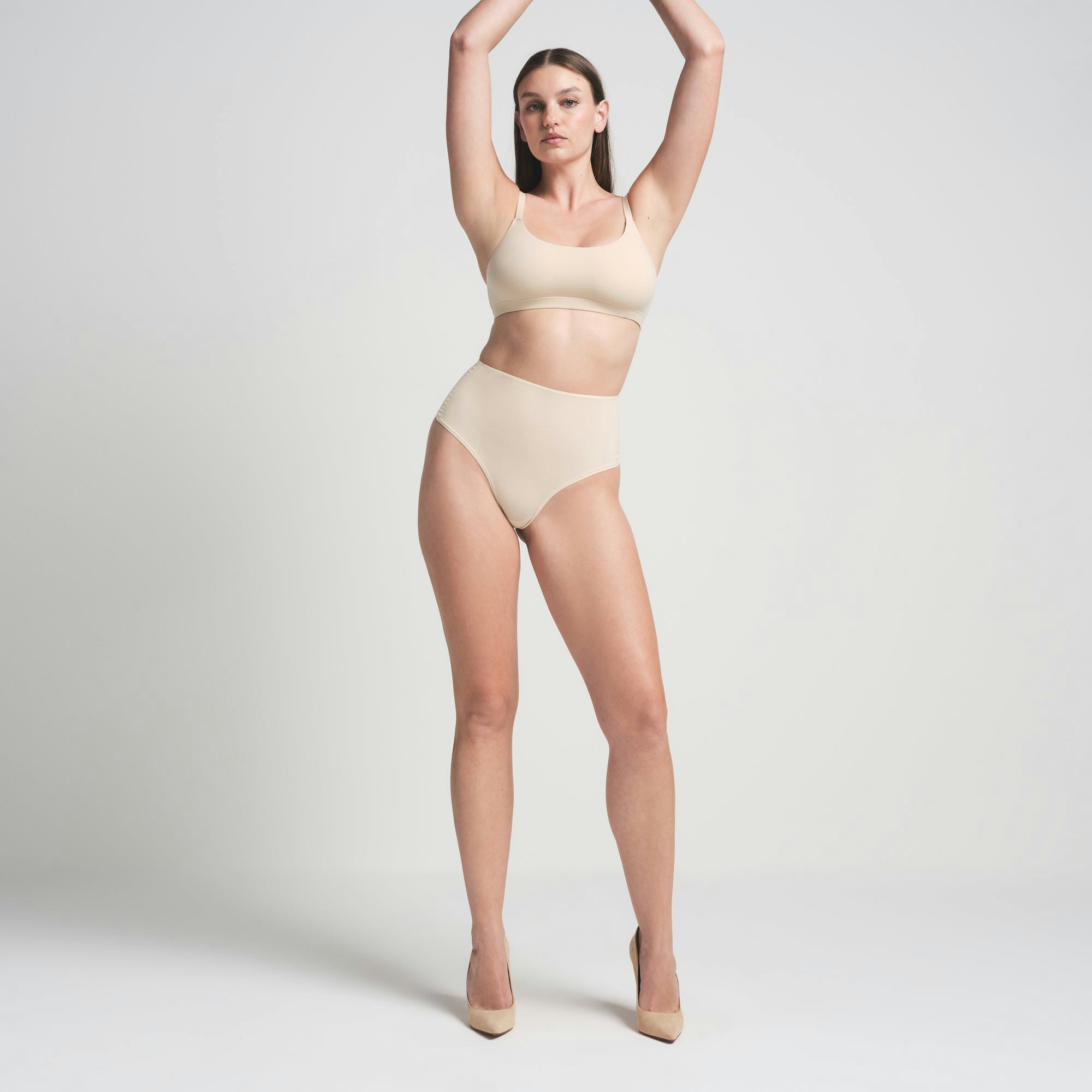 FITS EVERYBODY HIGH-WAISTED THONG | SAND ON A MODEL FRONT VIEW | FOCUS: 0.0, 1.0, 0.9