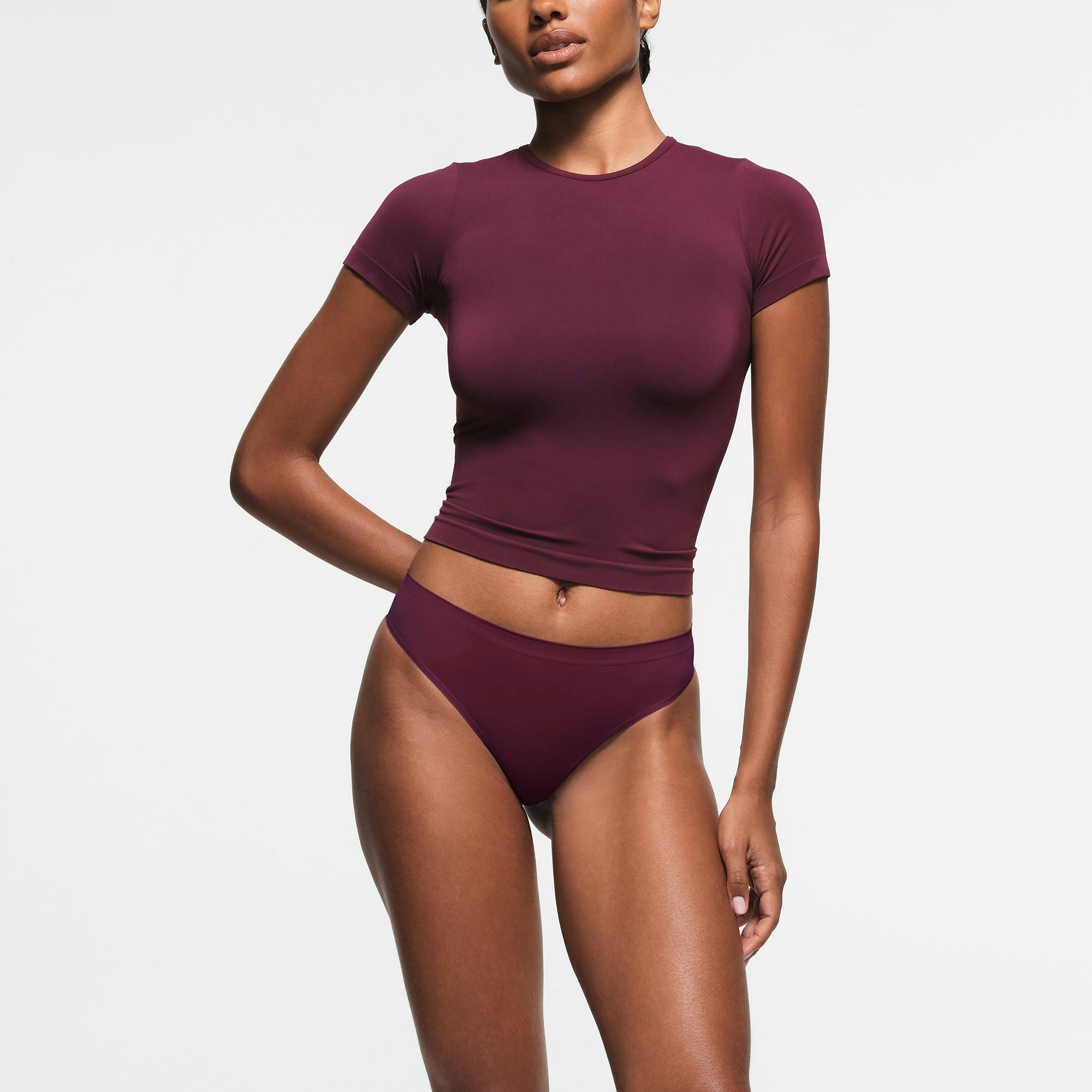 SOFT SMOOTHING SEAMLESS THONG | DEEP BERRY ON A MODEL FRONT VIEW