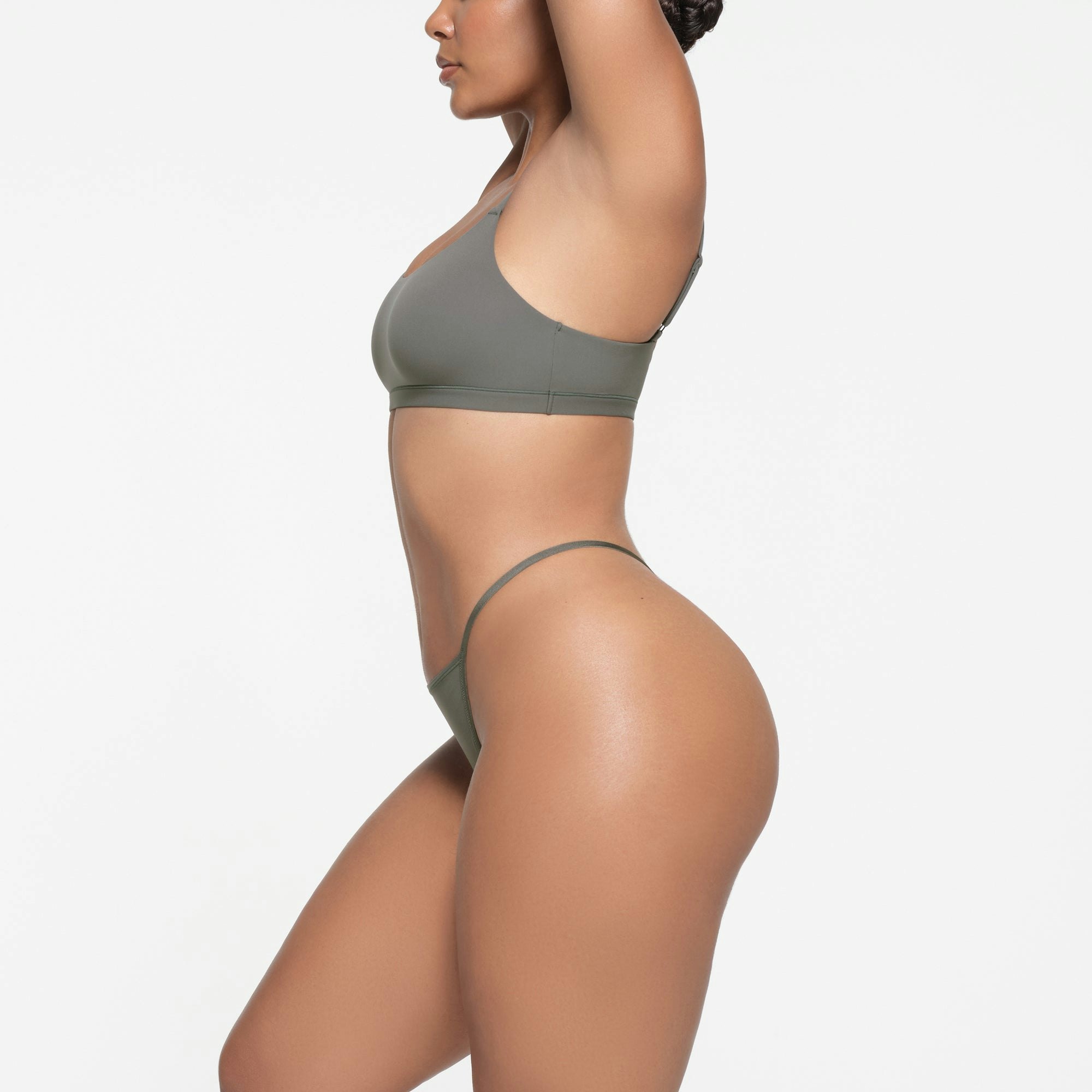 FITS EVERYBODY T-STRING THONG | GUNMETAL ON A MODEL SIDE VIEW