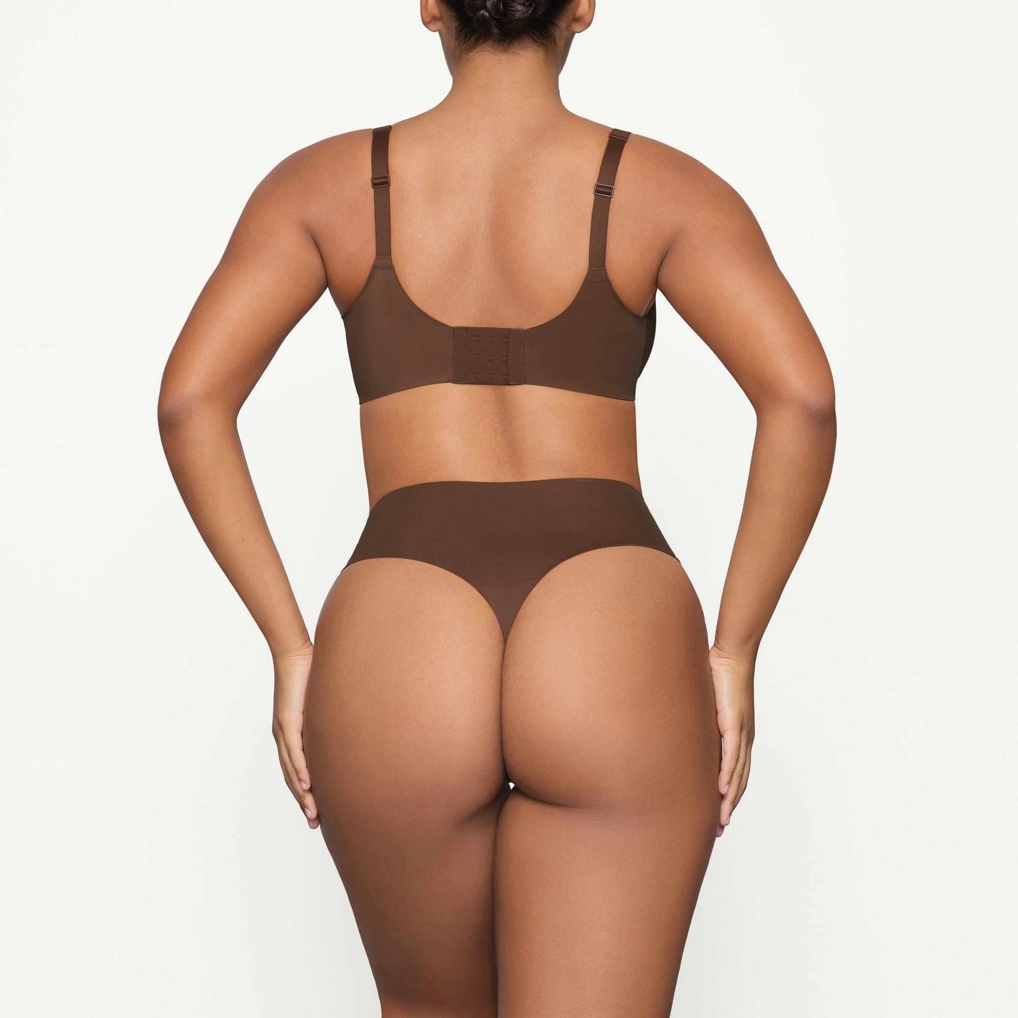 SMOOTHING INTIMATES HIGH-WAISTED THONG | JASPER ON A MODEL BACK VIEW